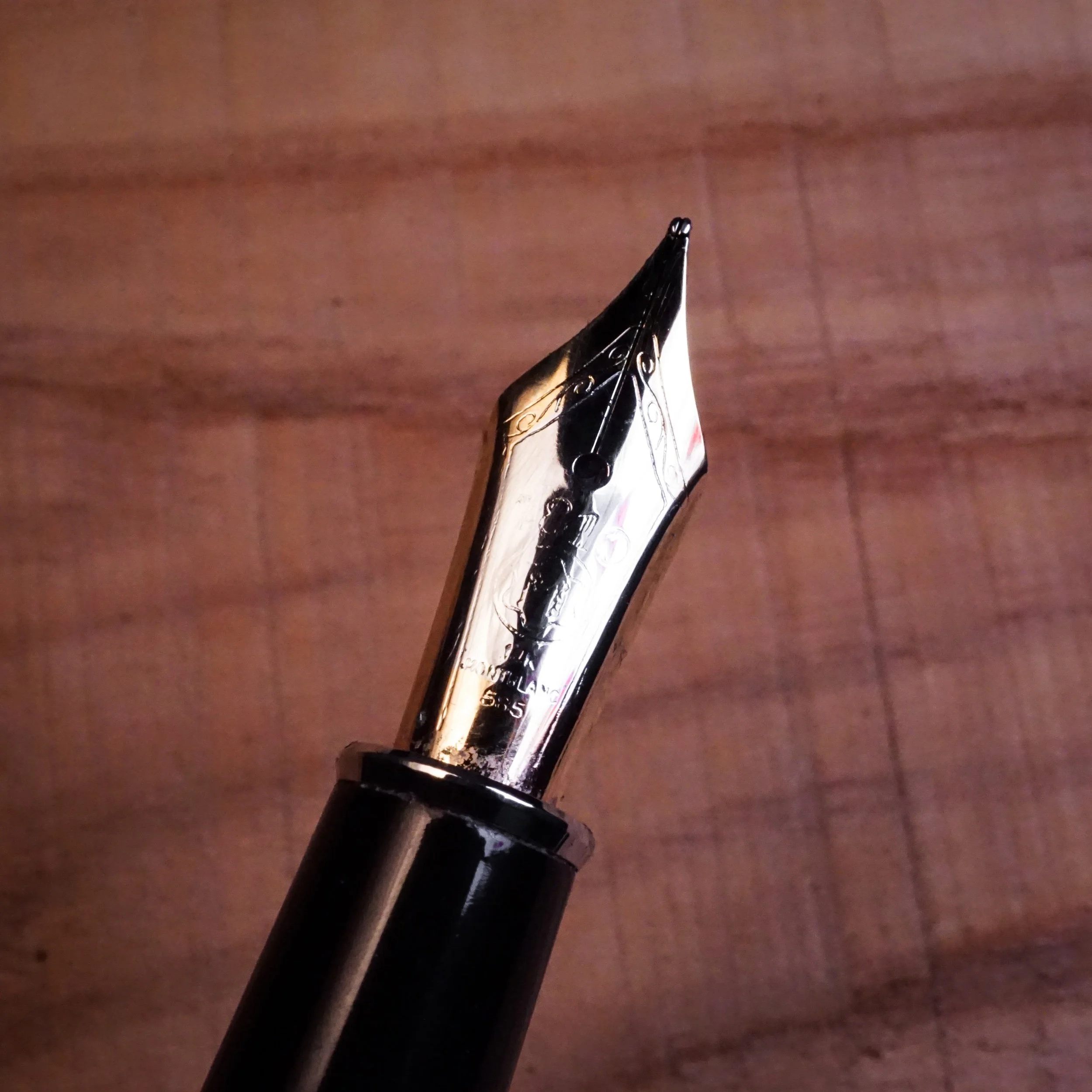 the fake 144 nib on the other hand, offers nothing more than a piece of stainless steel pressed with vaguely resemblant MB designs and a bad writing experience
