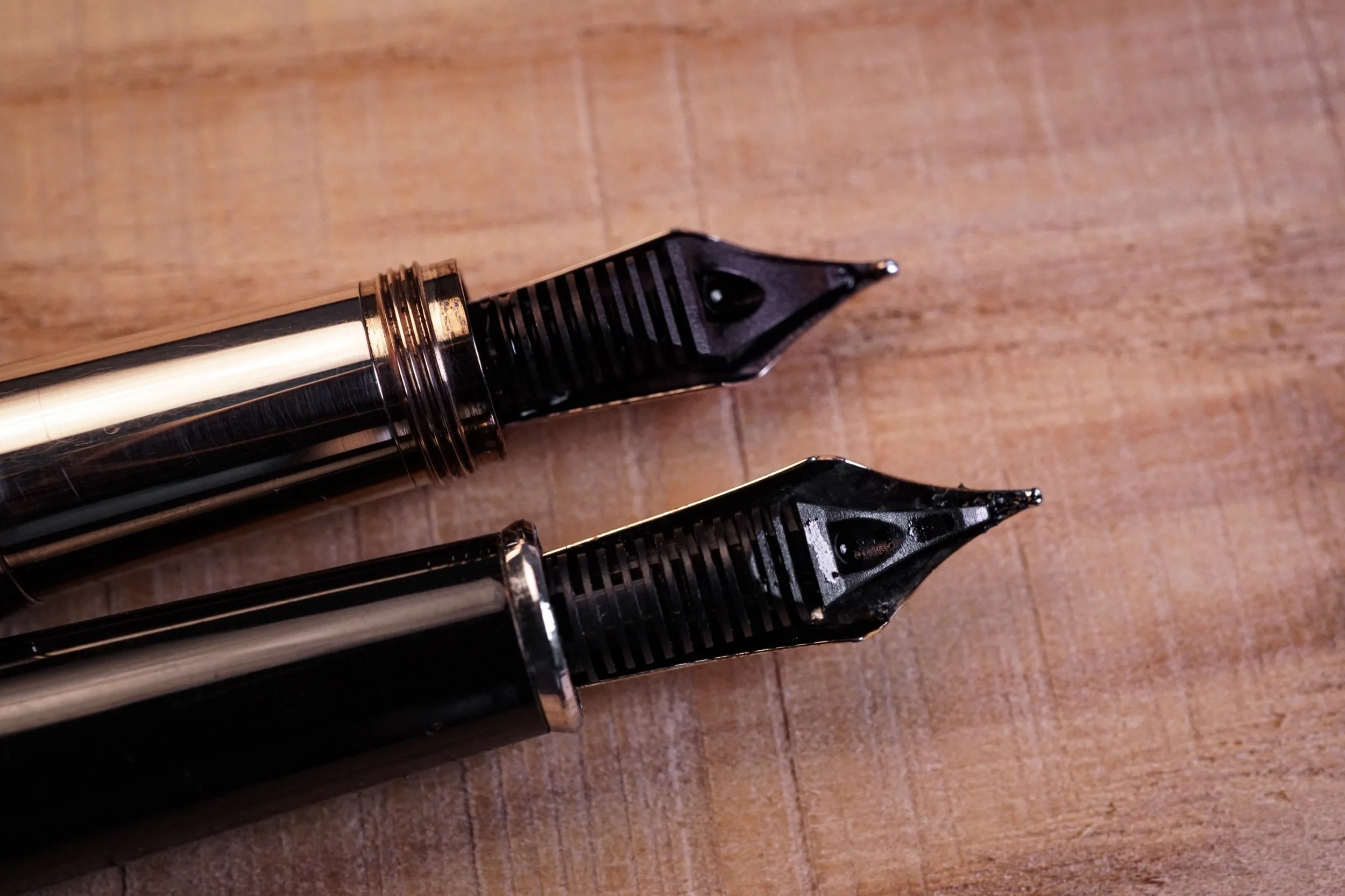 side by side comparison between the usual 144 feed (RetN and 144 use the same feed and nib profile), and the replica 144