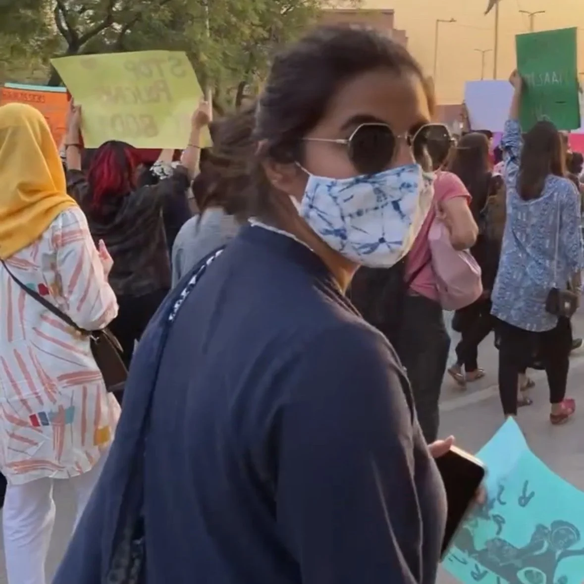 Participating in the Aurat March; photo credit to my mom :)
