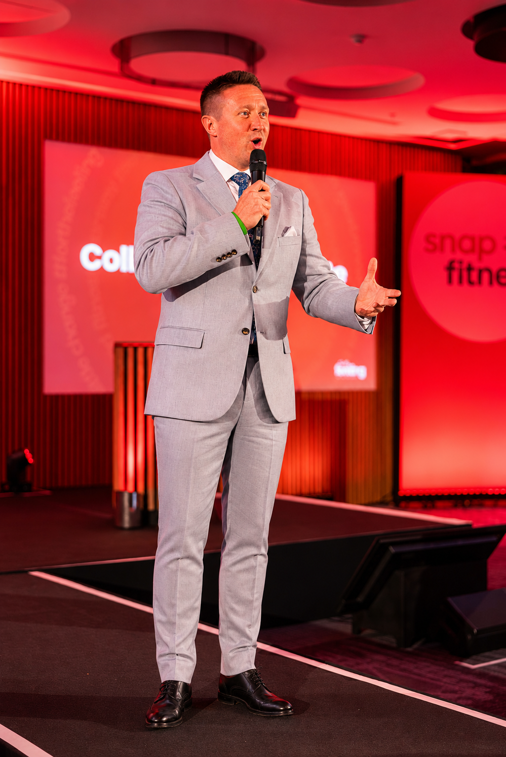 Live Event Host Matthew Walker persents Snap Fitness EMEA Summit 2026. Center Parcs Woburn.
