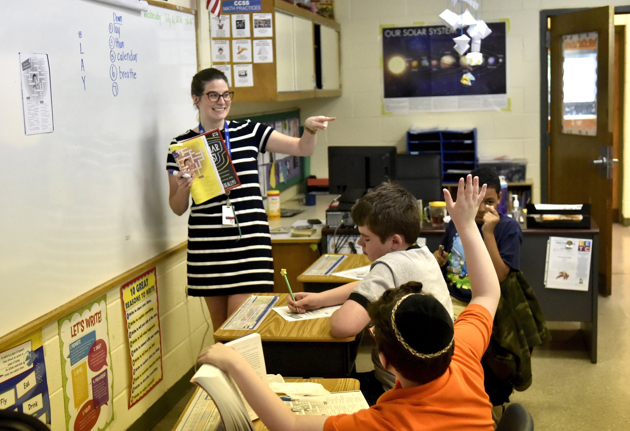 League School Classroom with Teacher at whiteboard