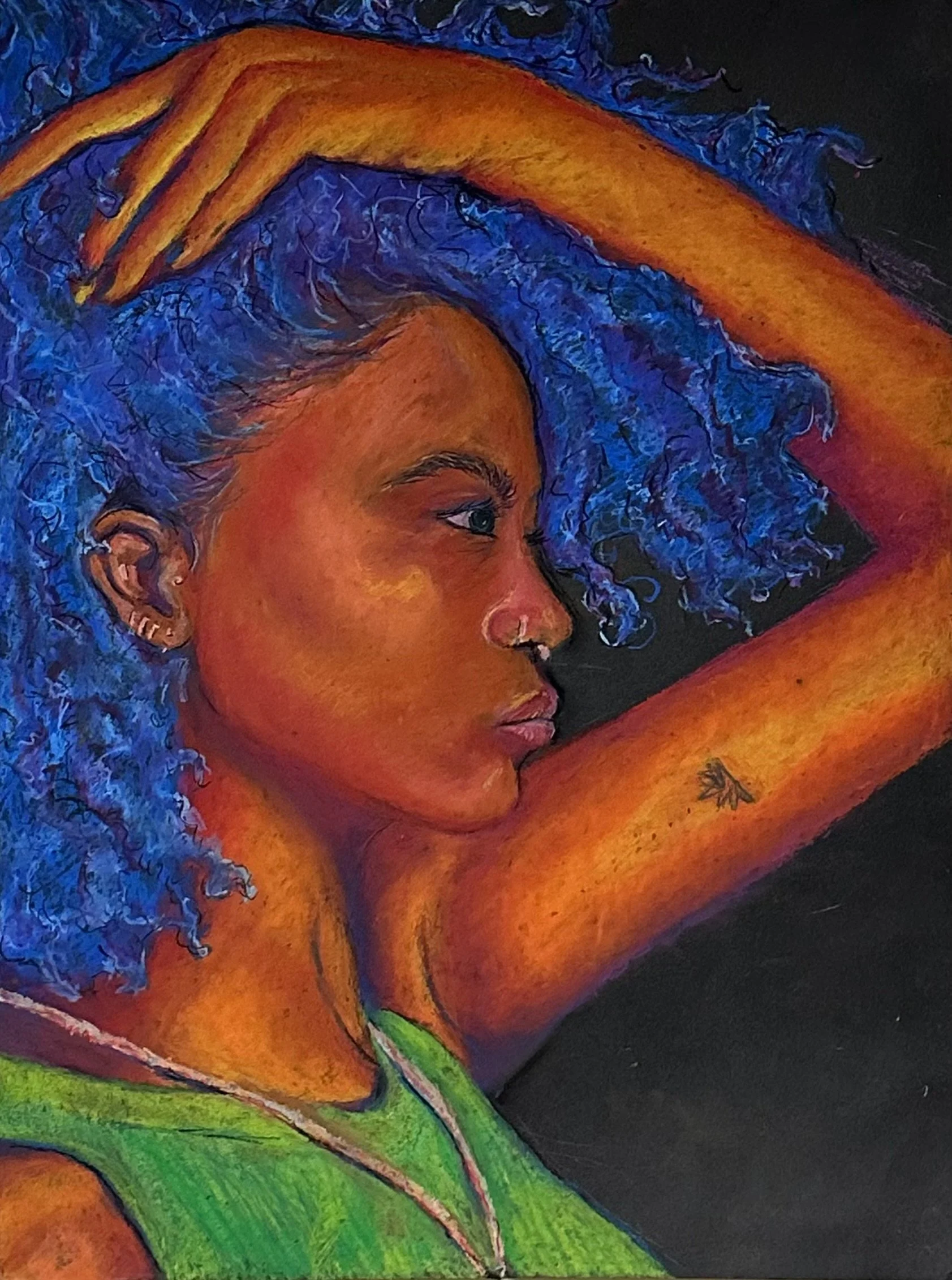 BLUE
This is a self-portrait where I focused on capturing myself where I felt most beautiful. I’ve come to pride myself in remaining composed and determined despite the internal battle I fight with remaining grounded. The bright yellow shades of my s