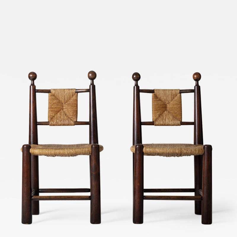 087_Jean  Royère - Pair of Oak and Straw Cha.png