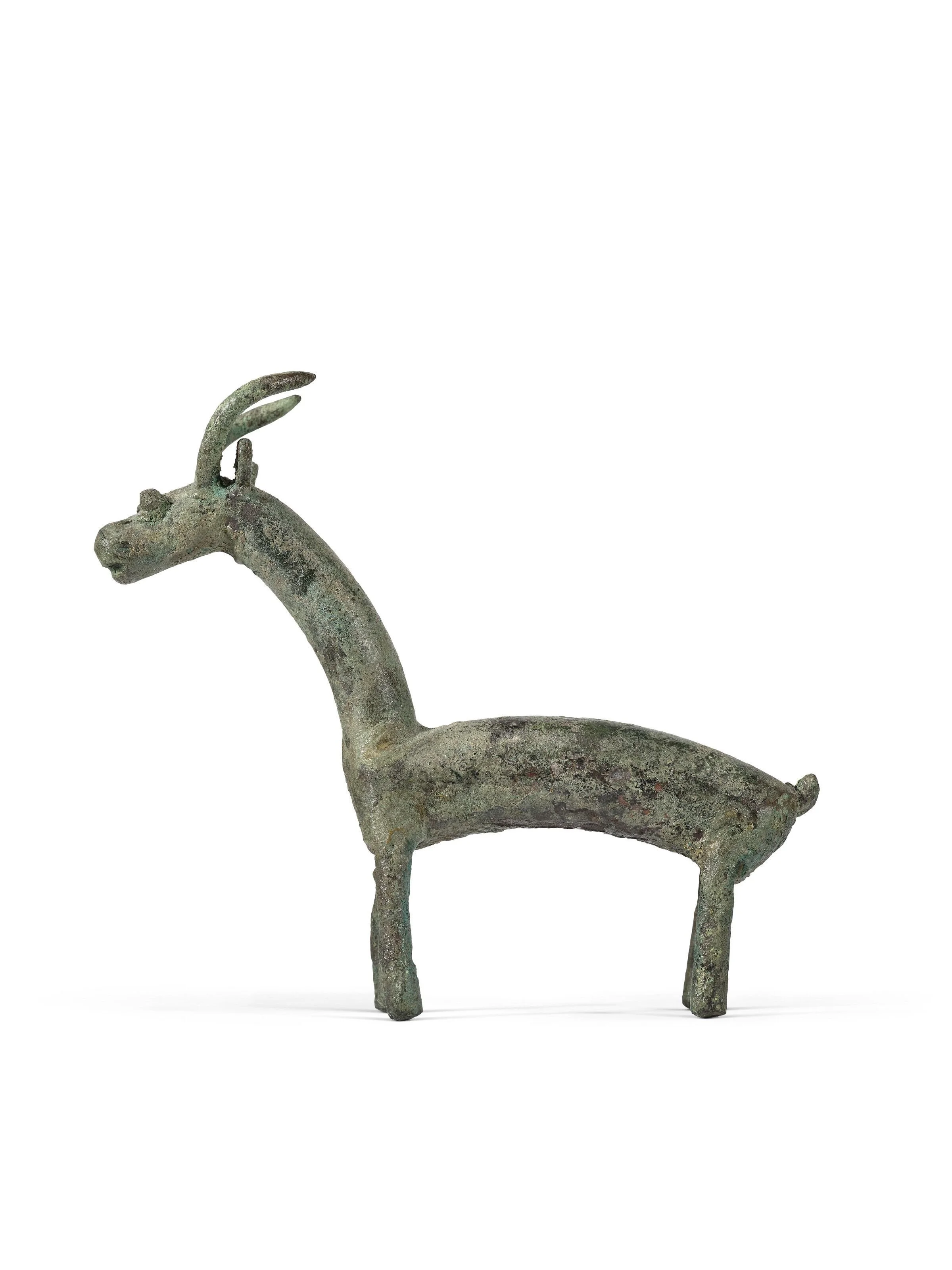 119_A SARDINIAN BRONZE GOAT, CIRCA 8TH-7TH C.jpg