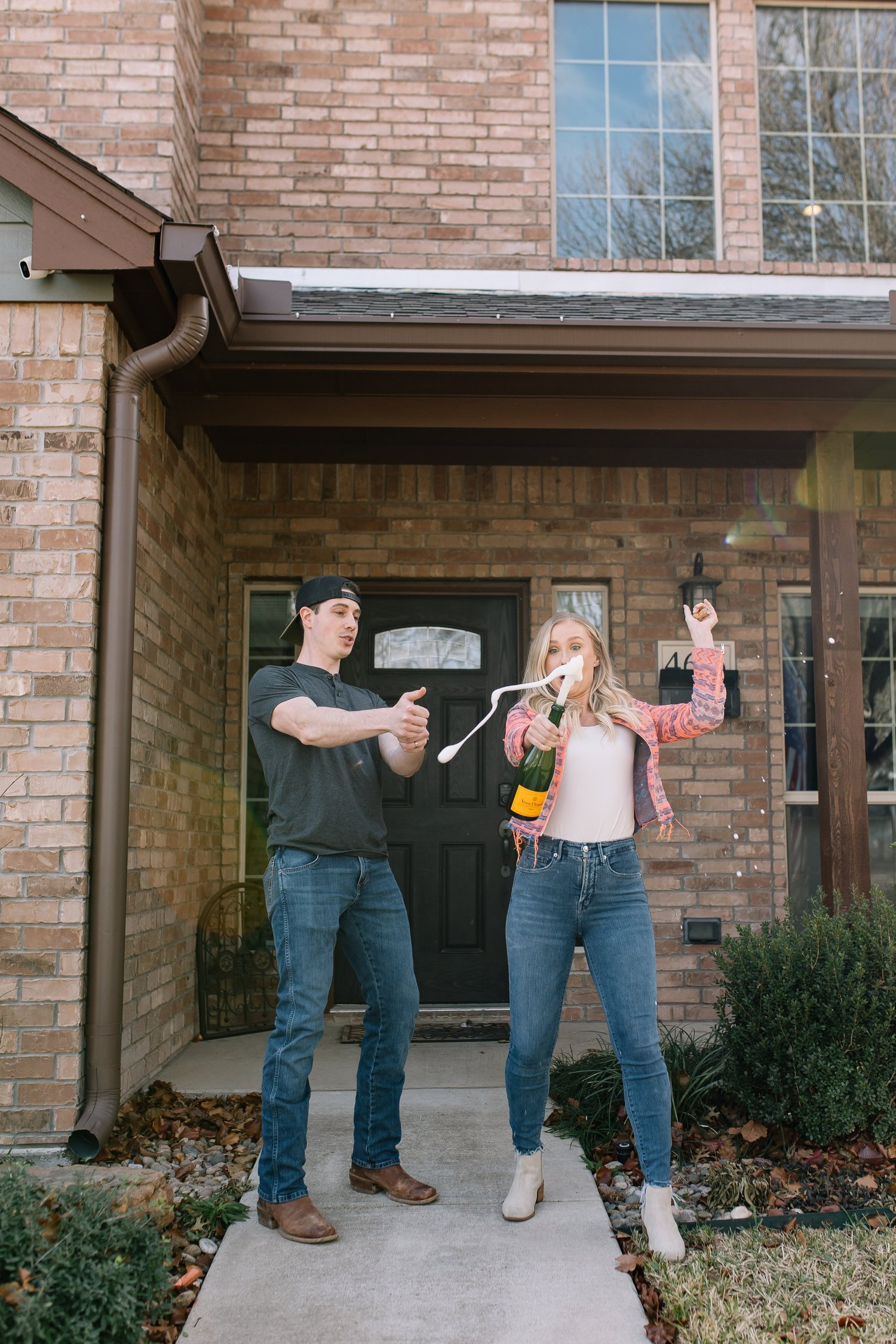 6th Ave clients celebrating on a front porch