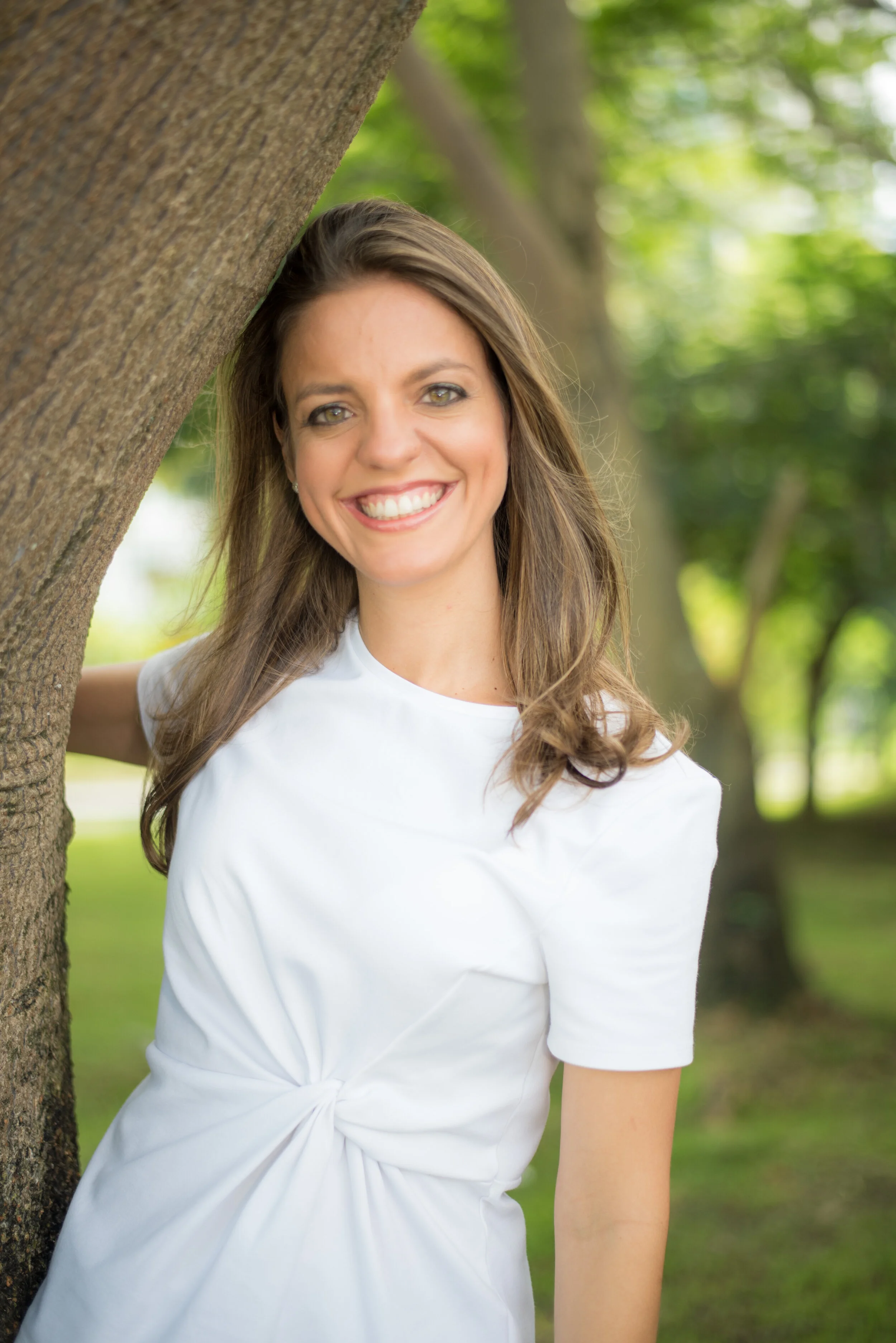 Various loaves of bread balancing on each other.