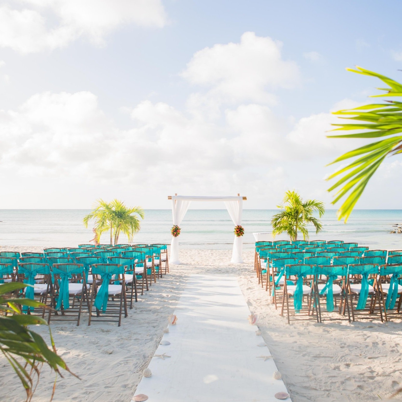 beach front ceremony, destination wedding travel agency, shoreline destination weddings