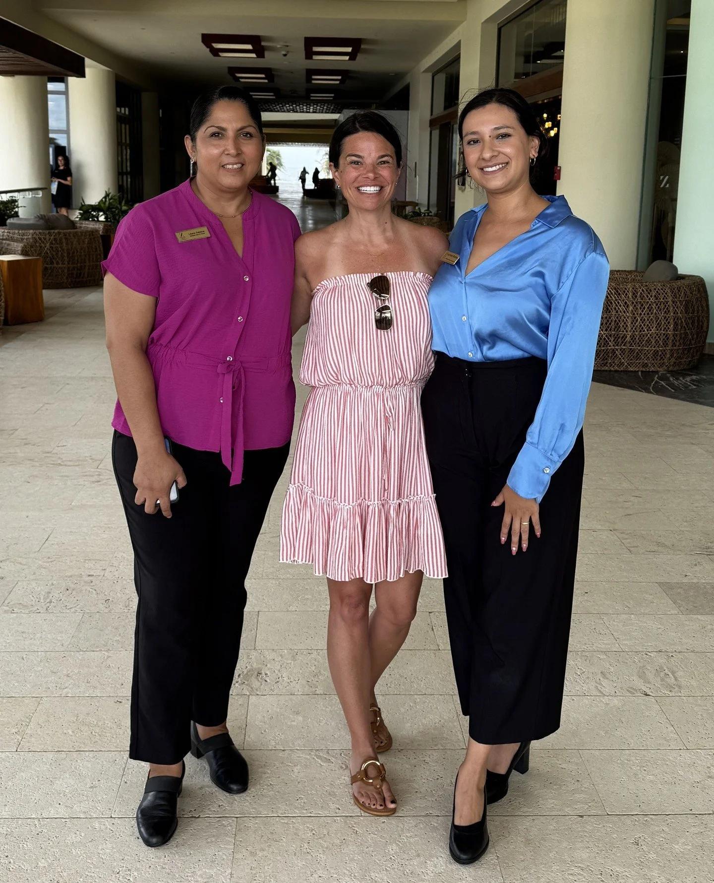 Greetings from one of our favorite resorts, Hyatt Ziva Cancun!⁠ 😍⁠
⁠
Pictured here is Andrea and the resort's wedding team. 📸⁠
⁠
This is what we mean when we say that working with a boutique travel agency makes all the difference when planning a de