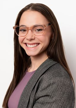 Indra Mursid MS LPC therapist smiling, offering affirming counseling for anxiety, depression, ADHD, racial trauma, and identity concerns in Kansas City.