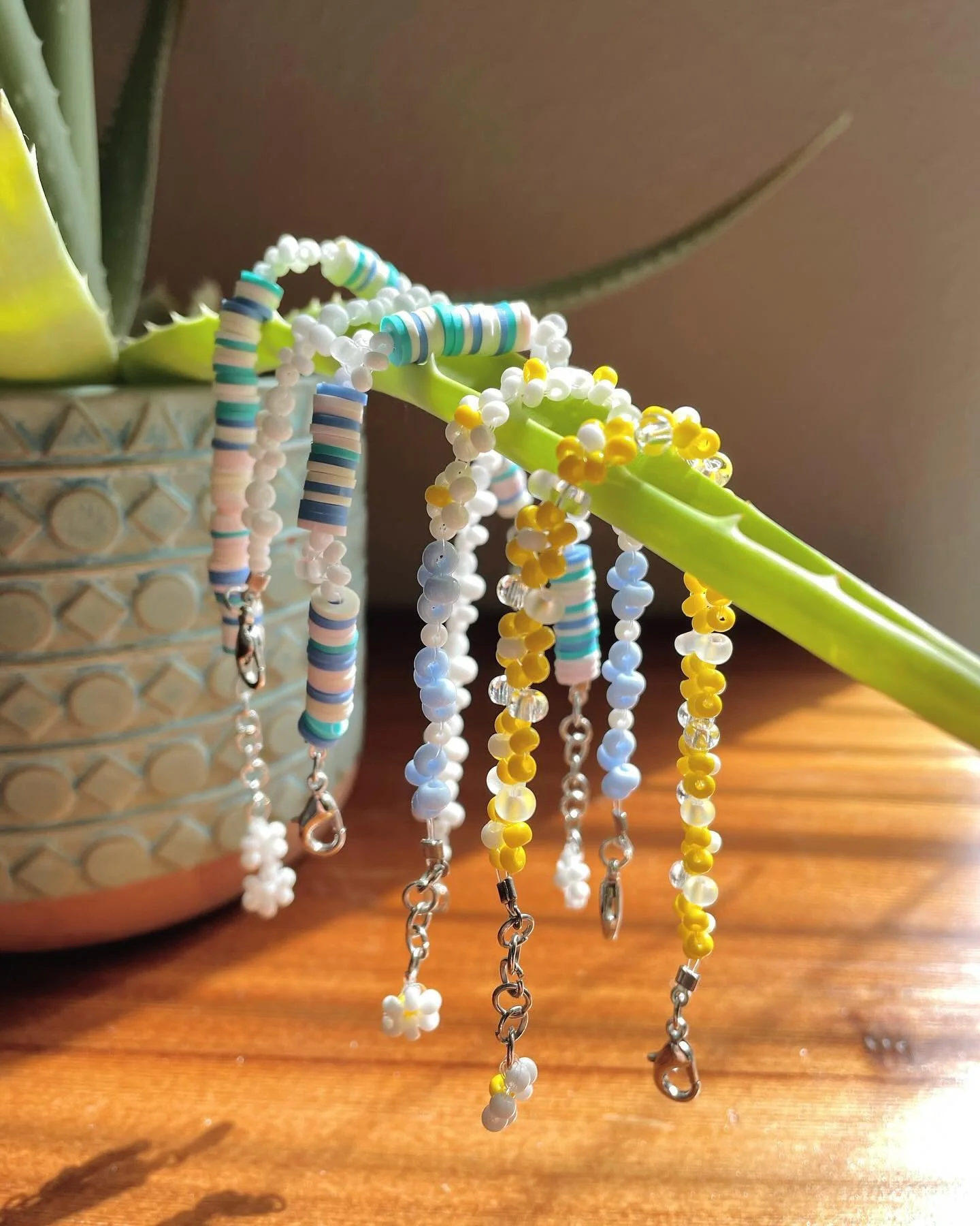 I can&rsquo;t be stopped! 🤭 I&rsquo;ve been having so much fun making bracelets 🌼〰️ Which one do you like the best so far? ✨

______________________________________________________
#jewelry #makingjewelry #beadjewelry #beadbracelets #artist #crafty