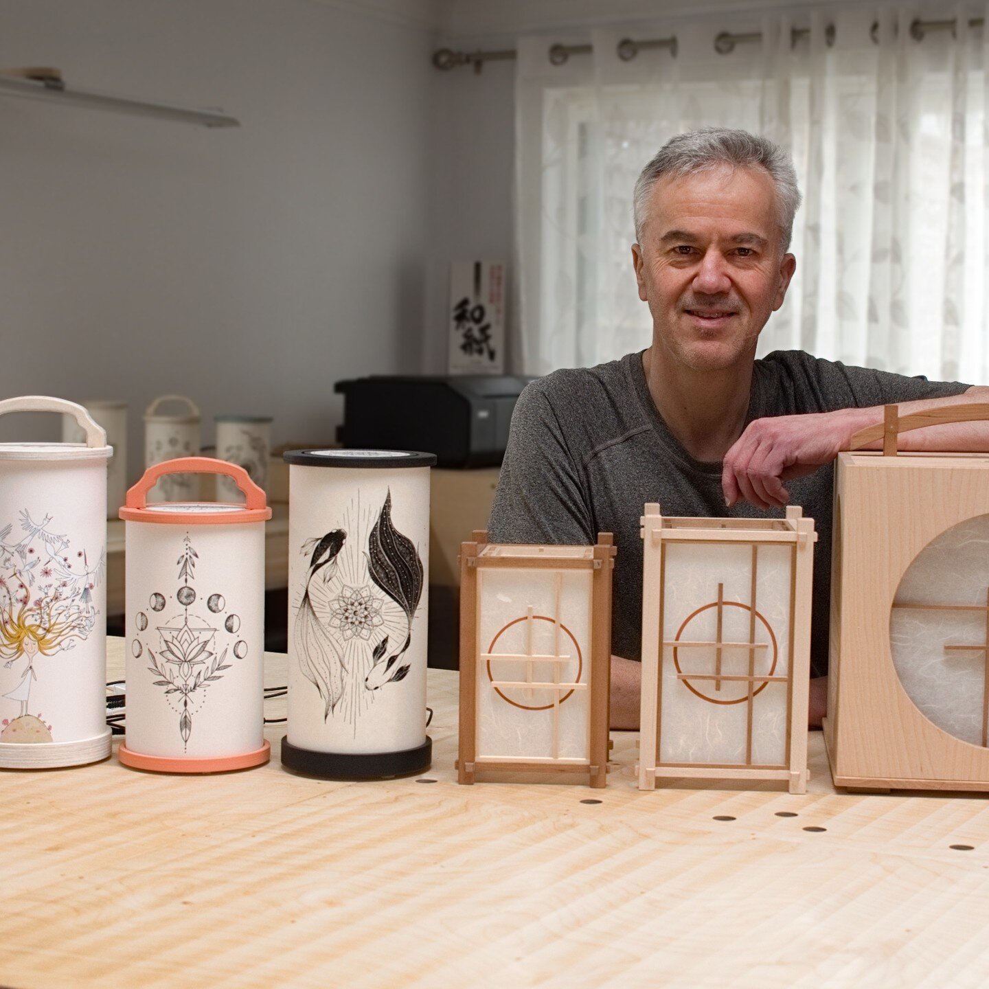 Showing some of my lanterns and lamps, with a rare picture of me. 

I'm busy with several other new designs, including a small candle sleeve version.

The smaller candle sleeve version will offer something that is still very special, but at a lower c