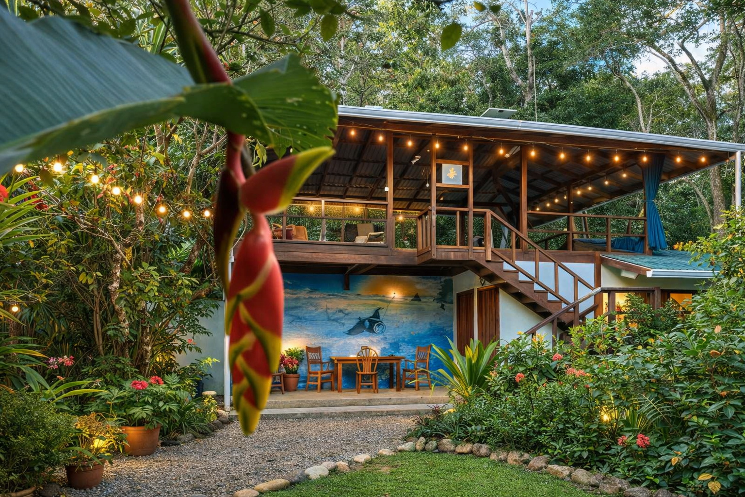 Tropical eco-lodge in lush greenery.png