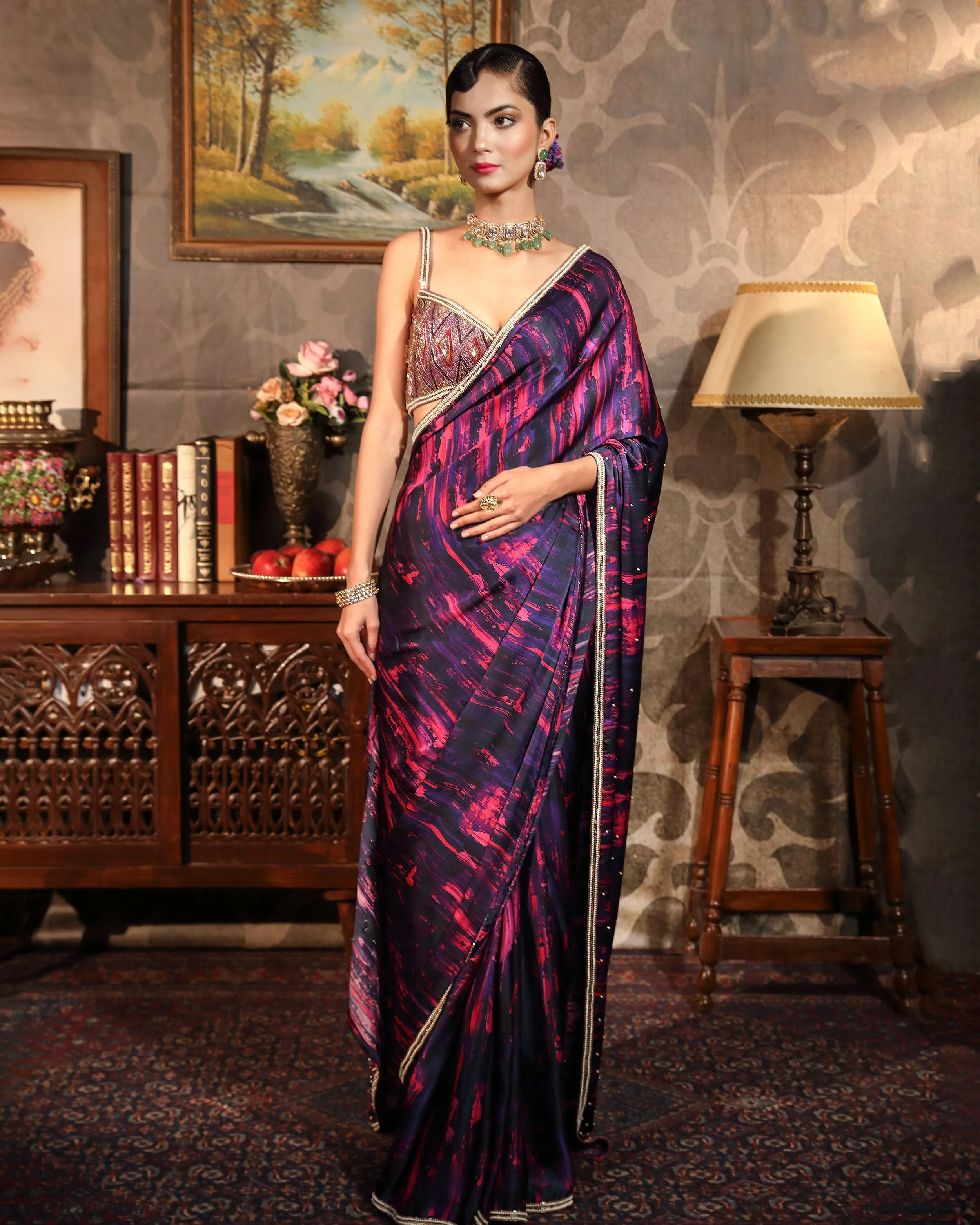 golden blouse with purple saree