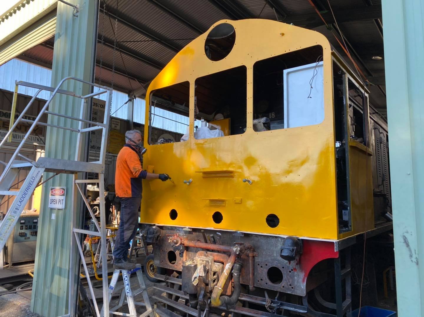  James applying a second coat of yellow to X18. 