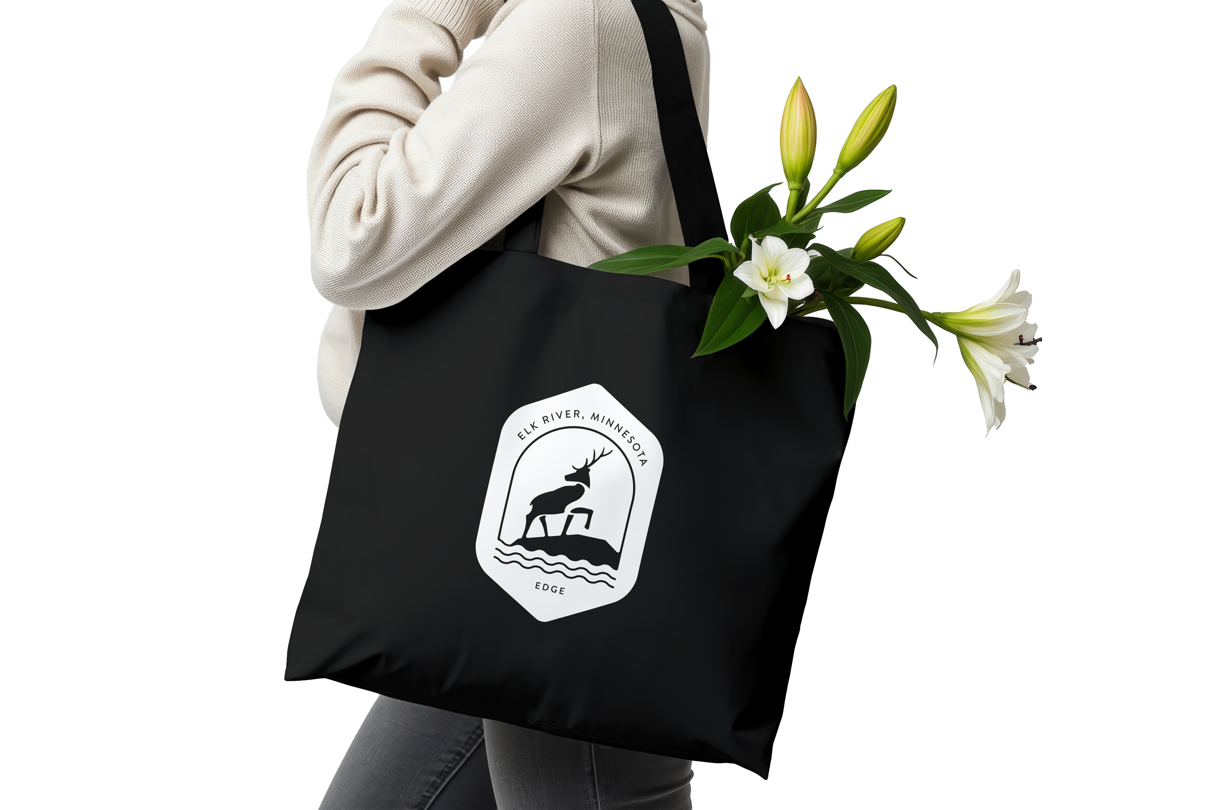 Woman shopping for flowers at Edge Bar and Boutique tote