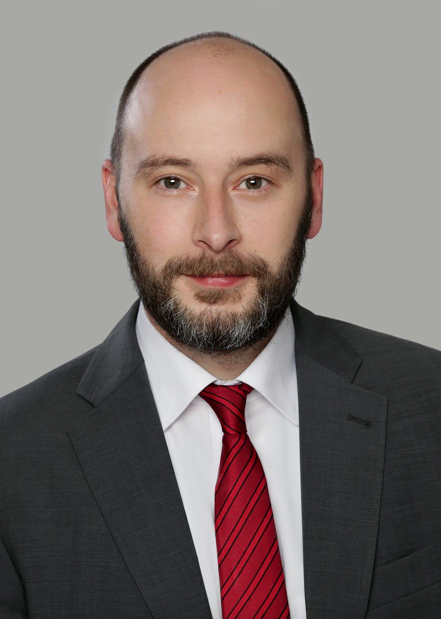 Dr. Eric J. Ballbach