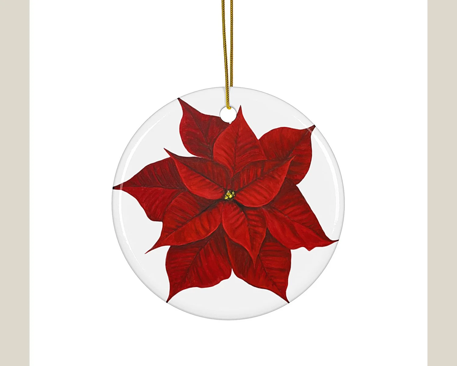 Red Poinsettia on a White Ceramic Ornament with a gold string by Jill Strickland