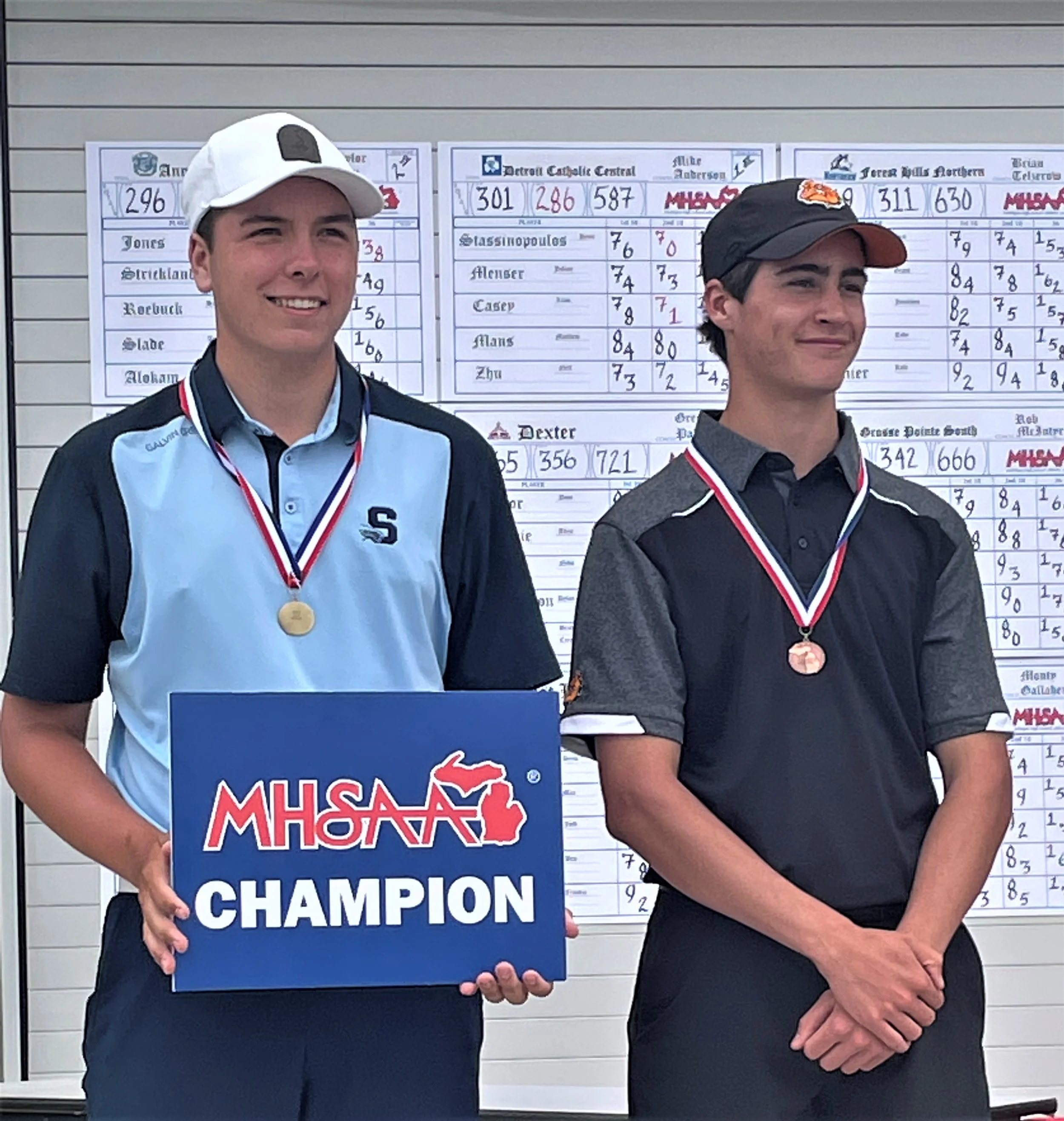 Boys golf D1 champ and runner up.jpg