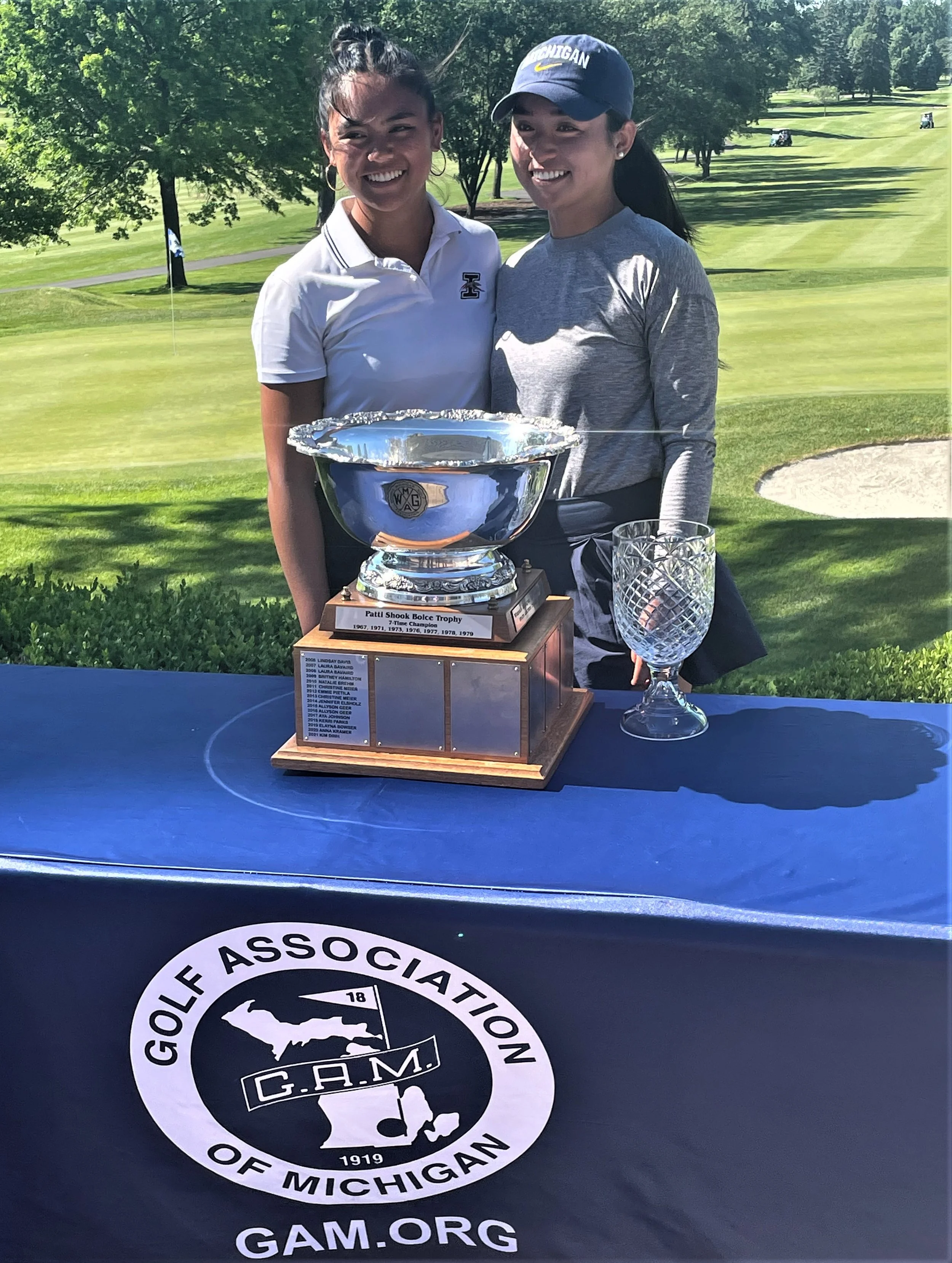 Dy sisters with Am trophy.jpg