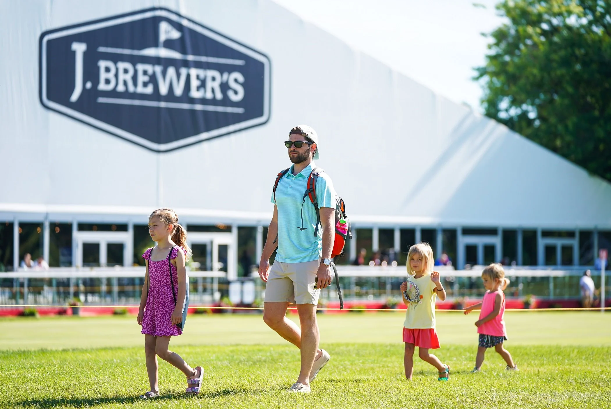 Meijer Father and kids J Brewer tent.jpg