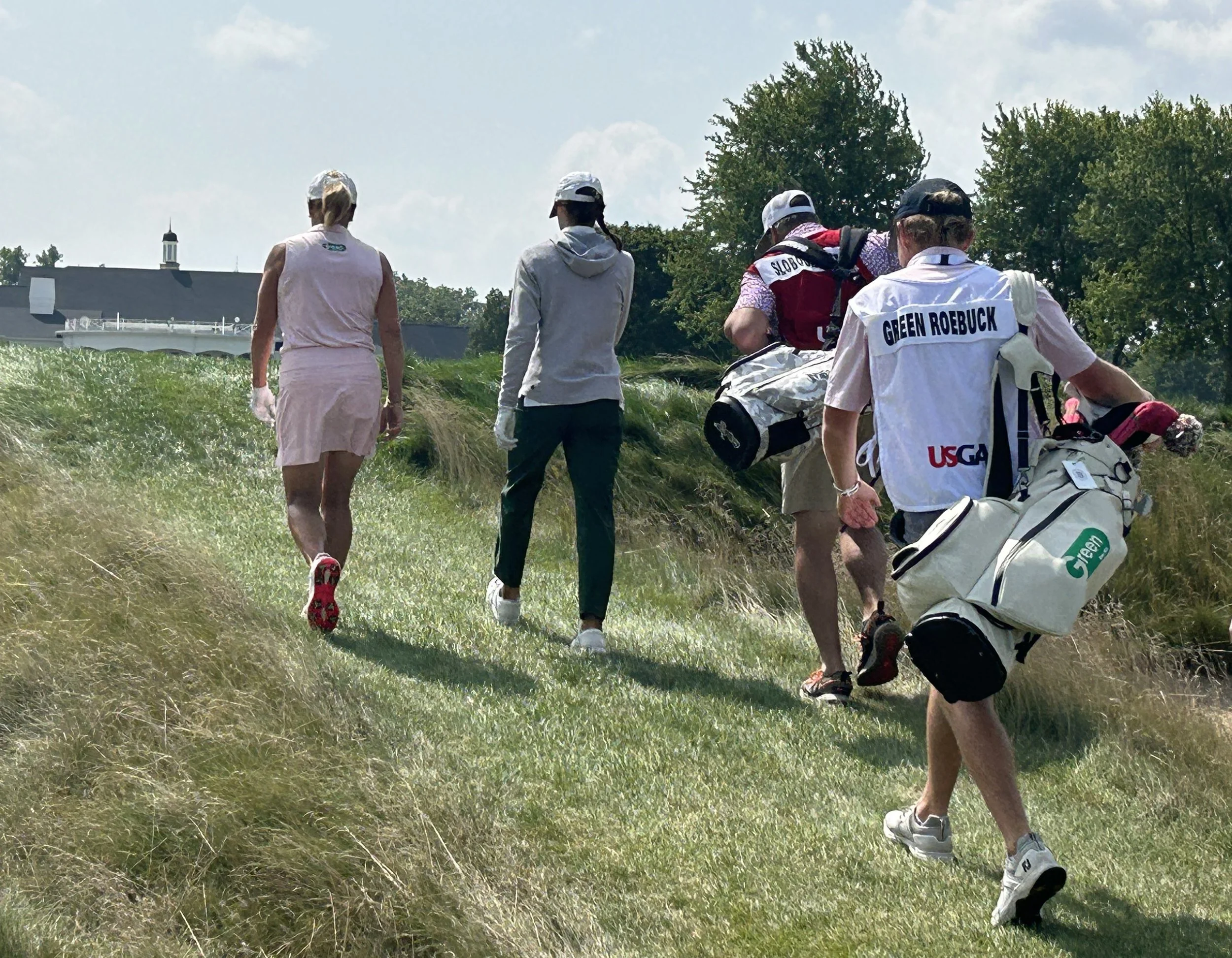 Stacy and Suzy walking up 18 at Barton Hills.jpg
