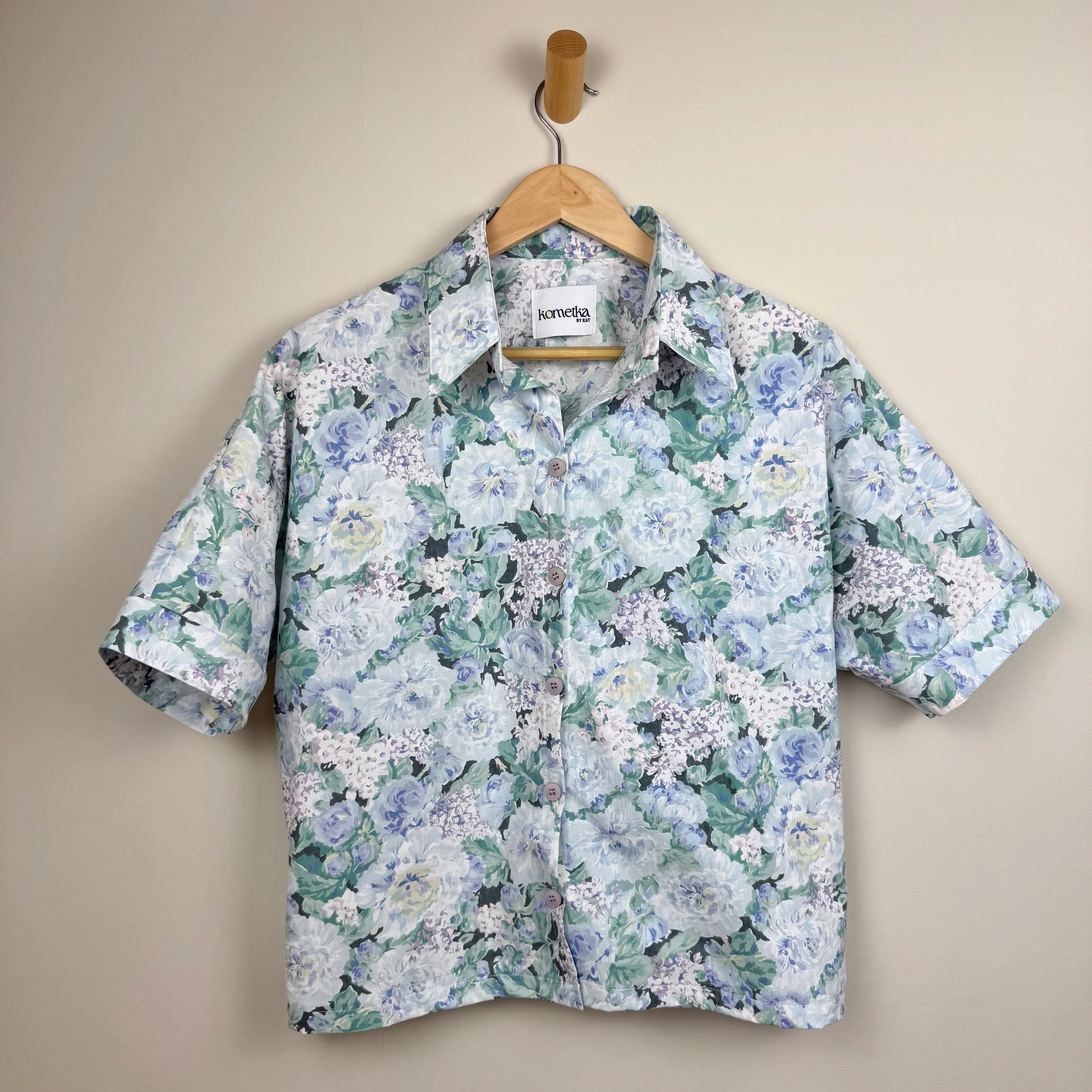 Upcycled floral button-up with relaxed fit and airy drape, eco-friendly slow fashion