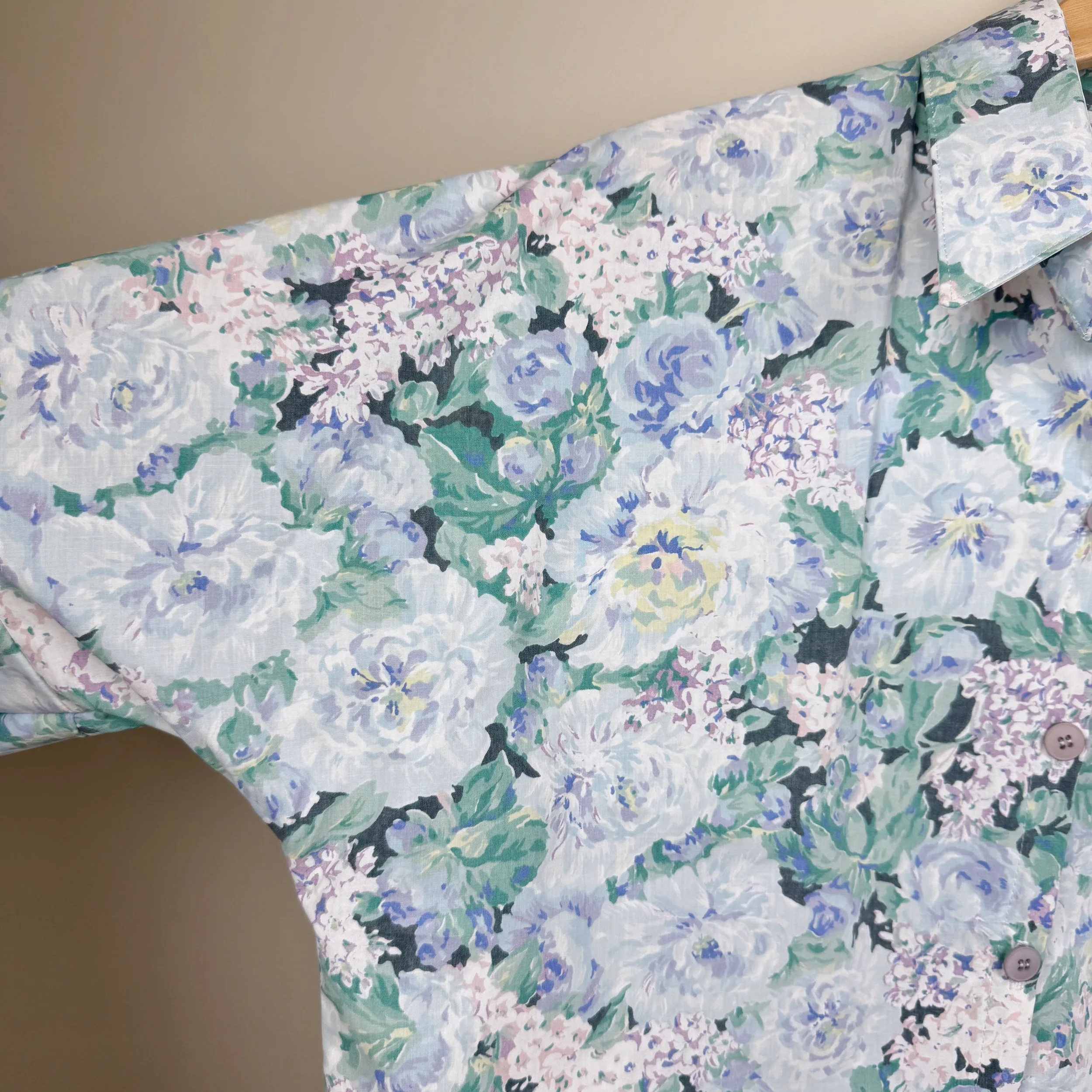 Upcycled floral button-up with relaxed fit and airy drape, eco-friendly slow fashion