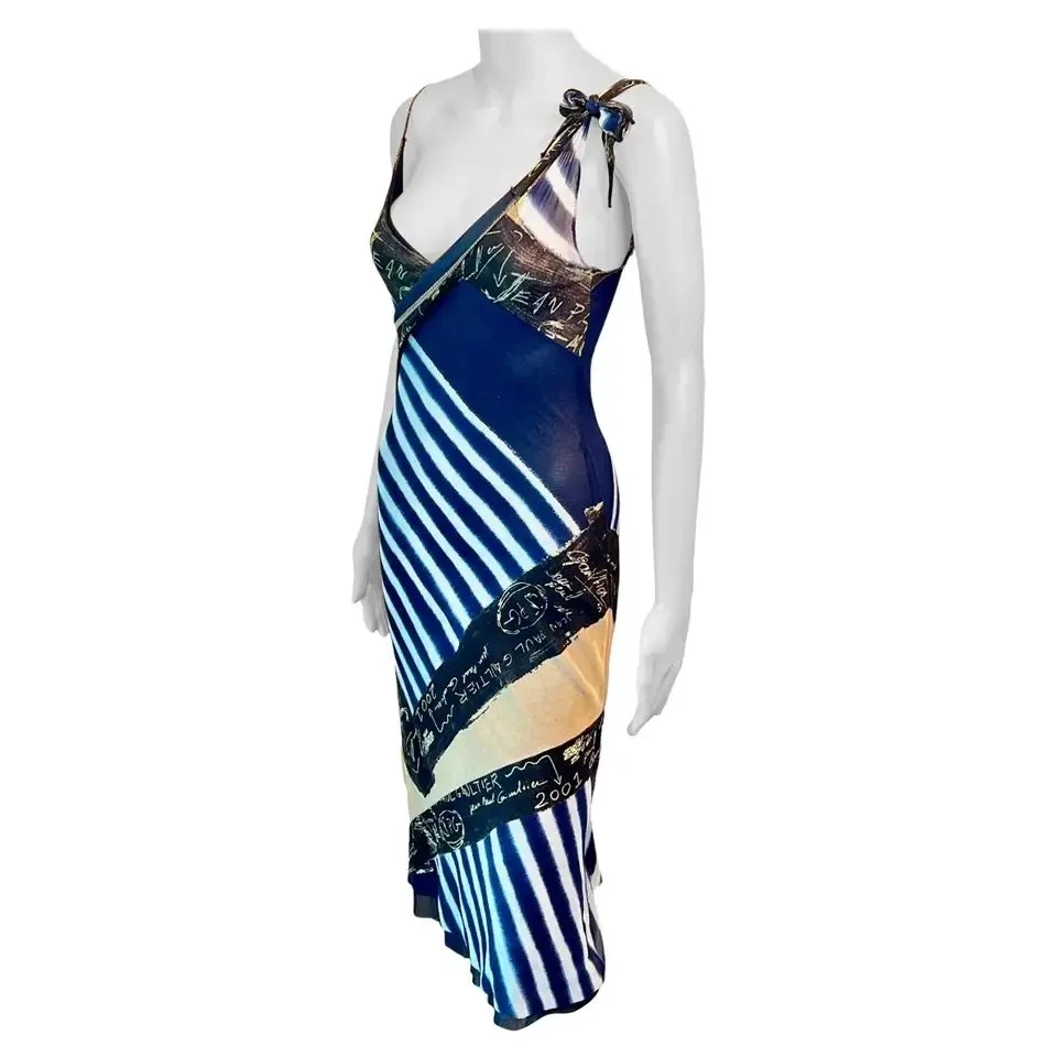 blue dress myntra Anouk by Myntra Women's Blue Geometric Print Cotton Tassel Tie Neck Dr