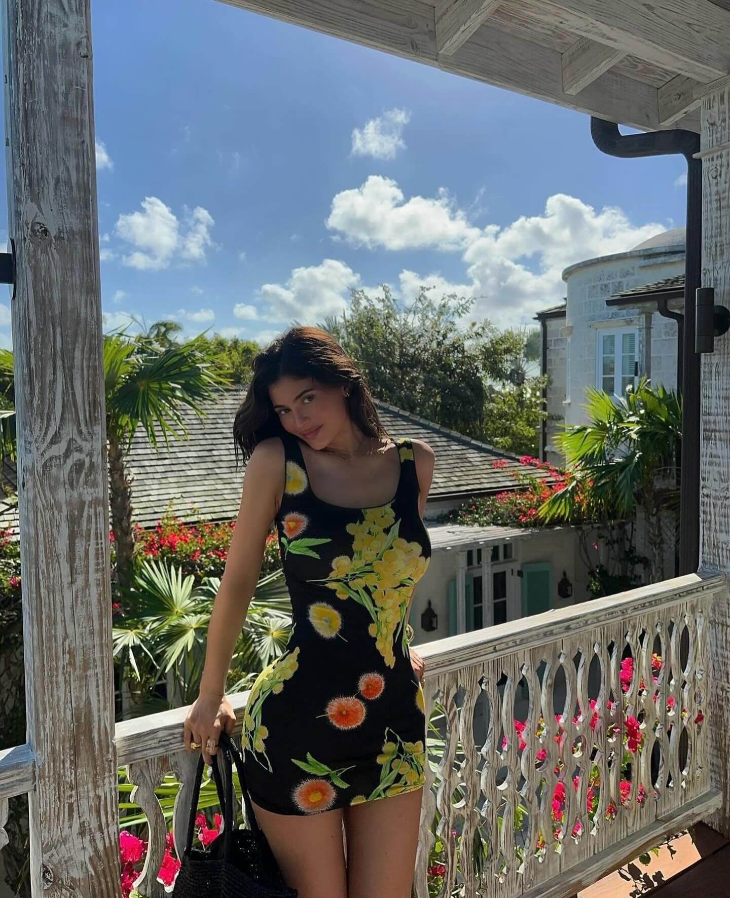 💛🖤🌼 @kyliejenner stuns while on vacation wearing a Gianni Versace dress purchased from @opulentaddict ! Styled by @makkaroo and @rosegrandquist and assisted by @ellngriggs and @roberts.charlee 
.
.
.
.
#kyliejenner #gianniversace #versace #kardash
