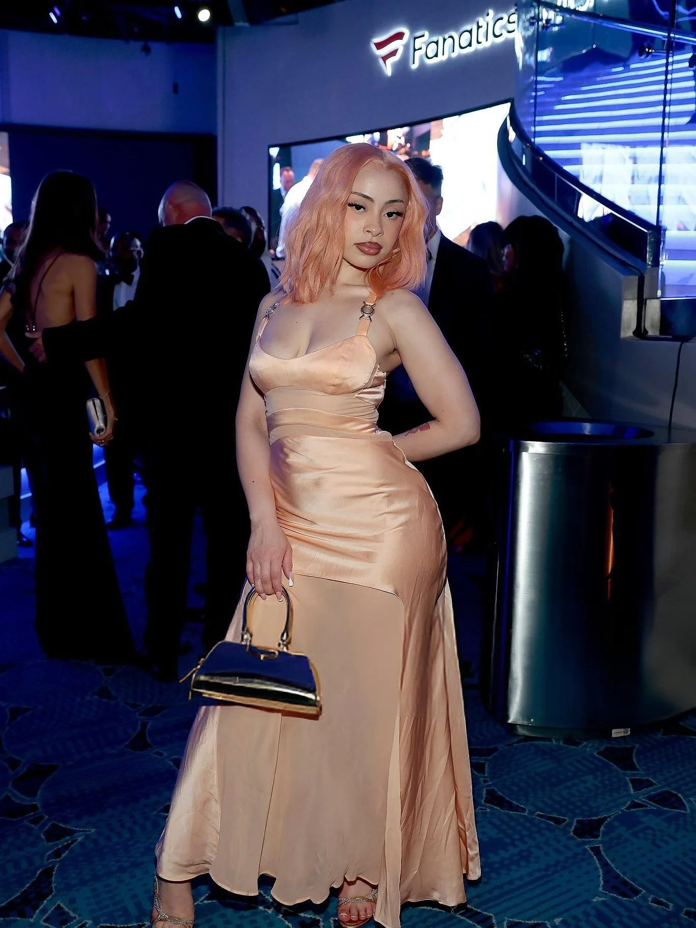 The hair, the dress, everything on point! ❤️&zwj;🔥 @icespice wears Spring 2005 Versace dress purchased from @opulentaddict for the @reform Casino Night and Gala! Styled by @timothyluke_ ! Another perfect coordination, picked up the same night, dream