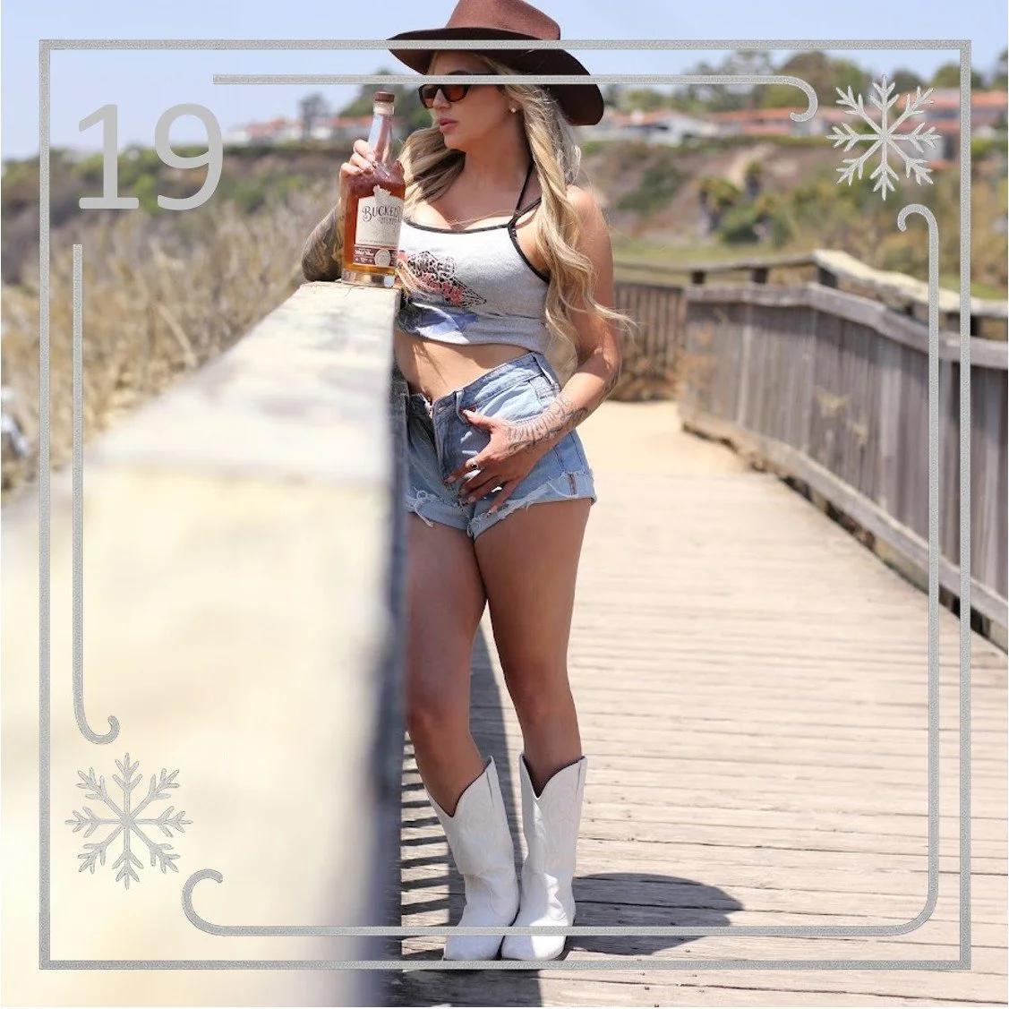 Day 19 is taking the scenic route. 🌅❄️
A bottle in hand, boots on the boardwalk, and a little December sunshine to keep the countdown warm.

The Bucked Up Advent Calendar rolls on tomorrow with Day 20.

#BuckedUpWhiskey #Day19 #HolidaySpirits #Cowgi
