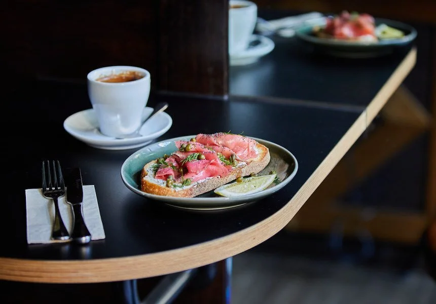 Up now: Lightly grilled sourdough topped with Smoked Salmon, labneh &amp; olive tapenade.