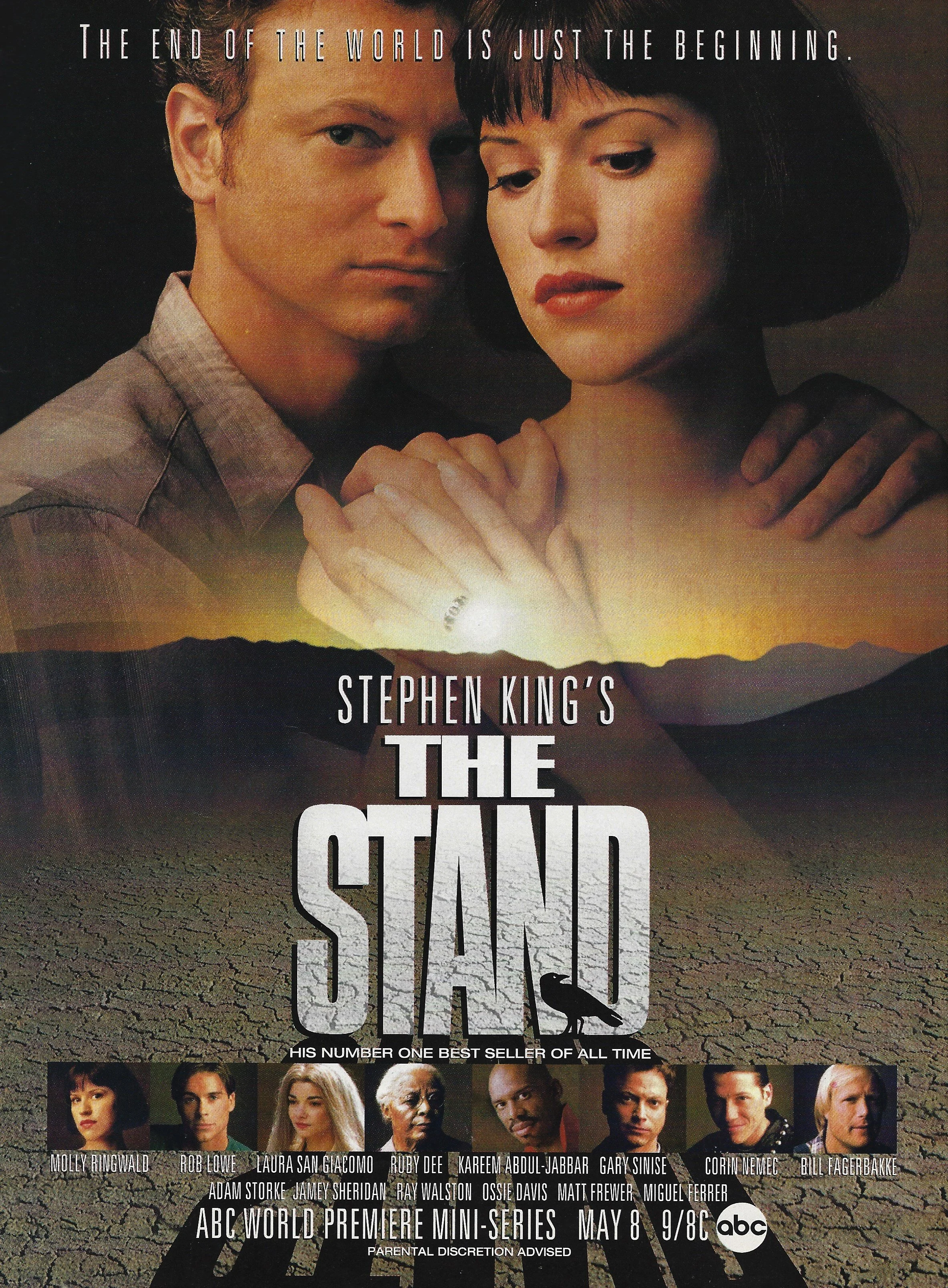 Poster for the TV mini-series 'The Stand' based on Stephen King's novel. The poster features a close-up of a man and woman with a faulted, desert-like landscape in the background. Text at the top states, 'The end of the world is just the beginning.' Below the title, there are images of the main cast members with their names. The show premieres on ABC on May 8 at 9/8c, with a parental discretion warning.