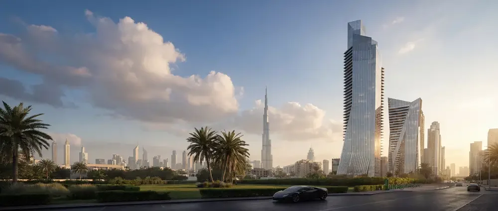 Modern cityscape with tall skyscrapers, palm trees, and a car on the road at sunset in Dubai.