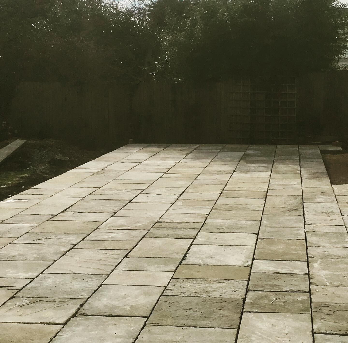 Reclaimed York stone terrace laid a few years ago. If the stone allows it, there&rsquo;s something lovely about the coursed style. #understated #reclaimedyorkstone #reclaimedyorkstonepaving #yorkstone #reclaimedmaterials #landscapedesign #stonepaving