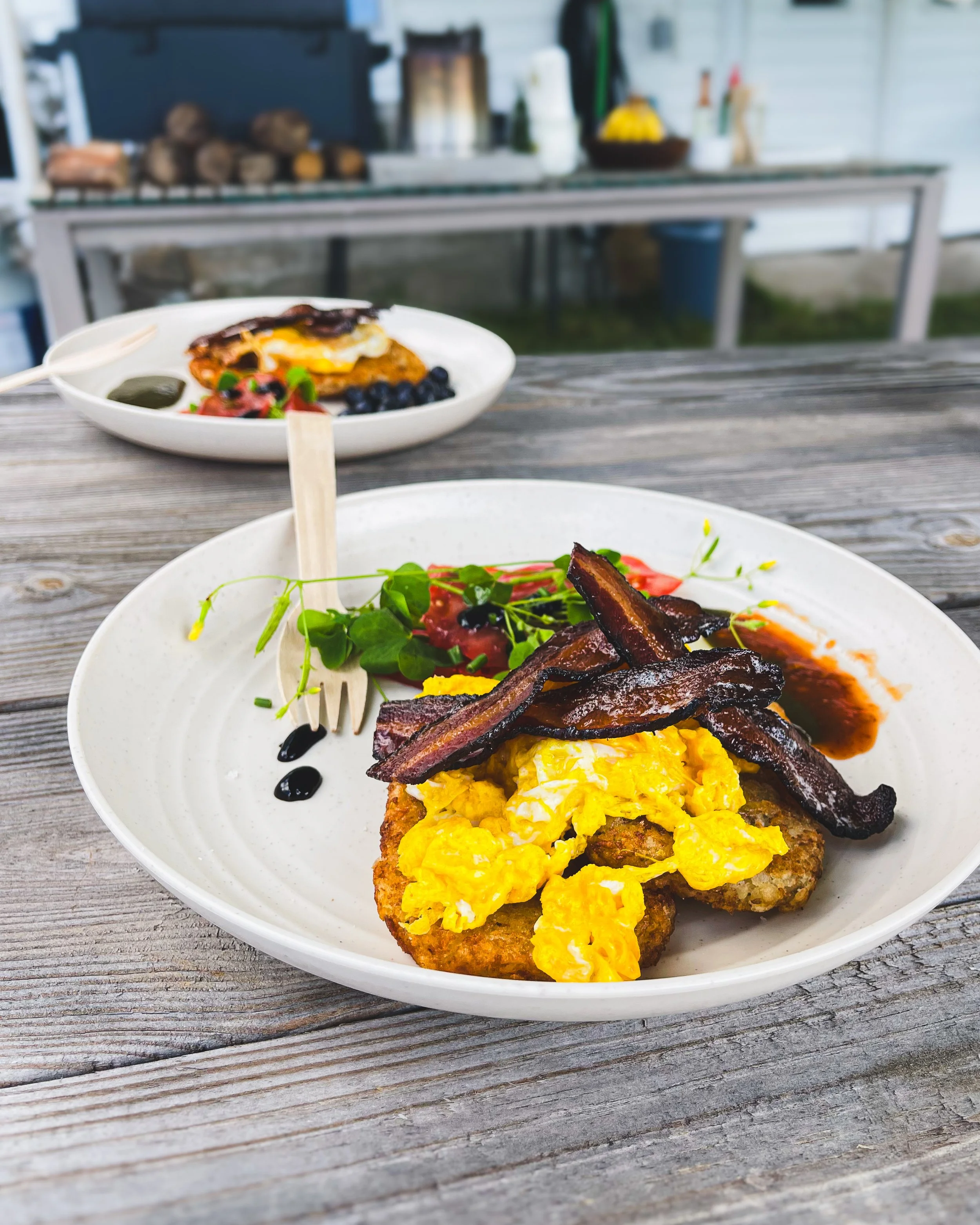 Farm fresh eggs, bacon, hash browns, and heirloom tomatoes at a Catskills campout