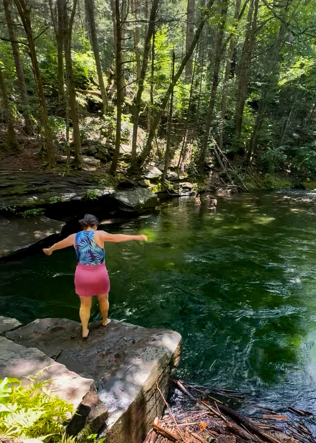 jumping off the rocks at peekamoose blue hole Summer Grillin 2026.JPG