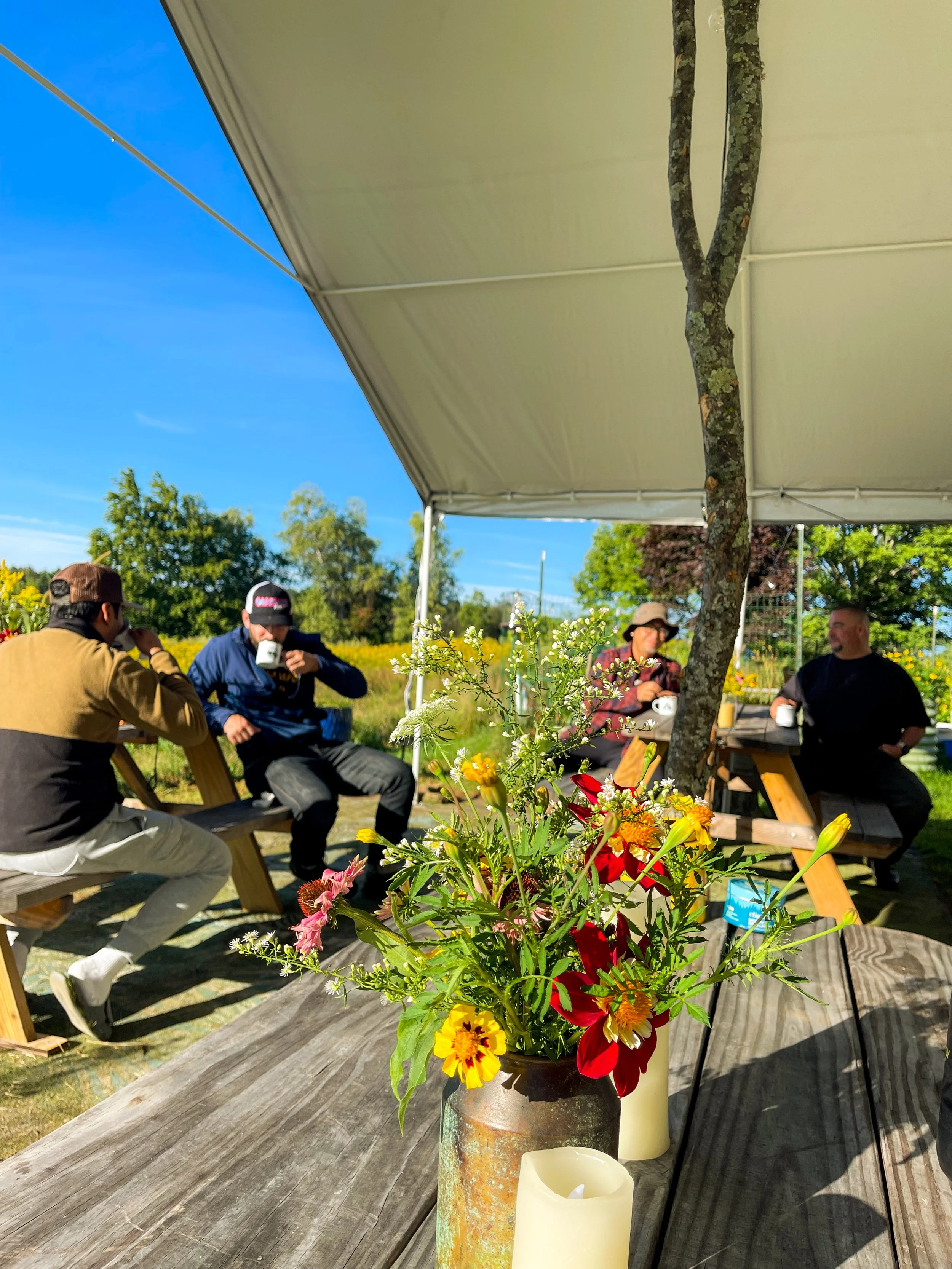 Sipping Coffee in the Pavilion Motocamp Setup Mountain Cruisin 2026.JPG.JPG