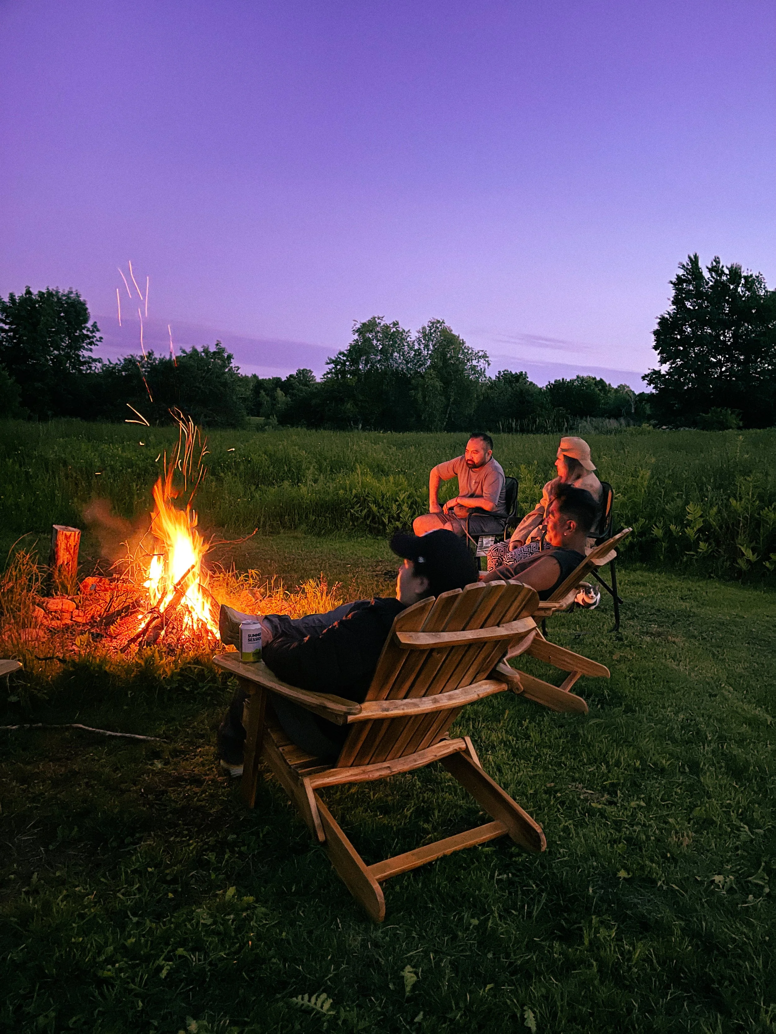 Staring into the Campfire with Alma Allan Andrea and Alex.JPG