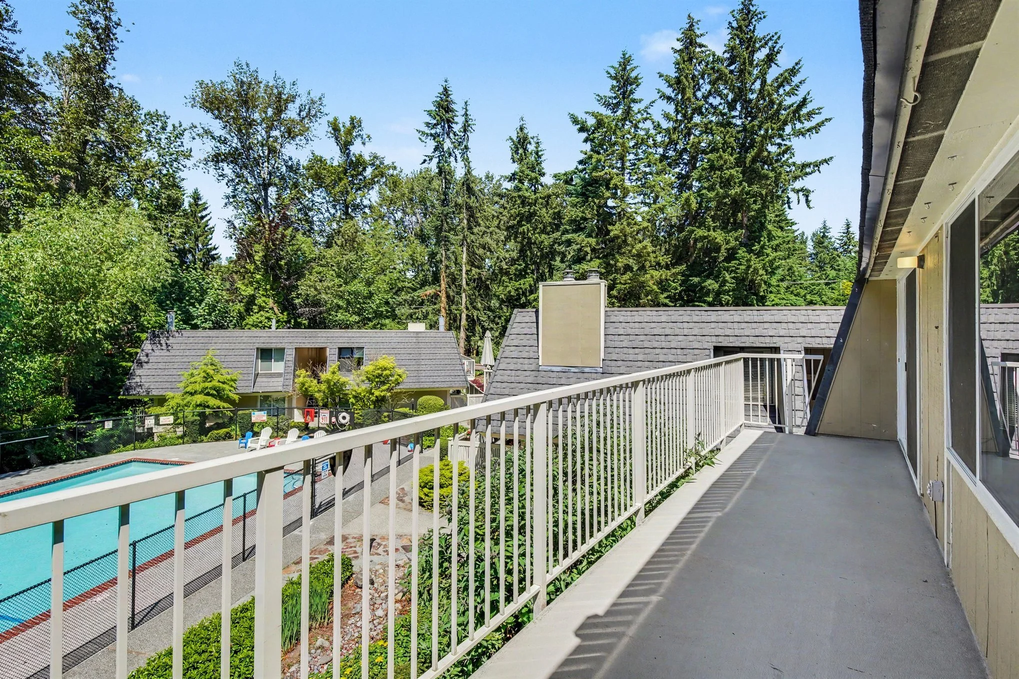Private Balcony with view of pool and greenbelt view 2