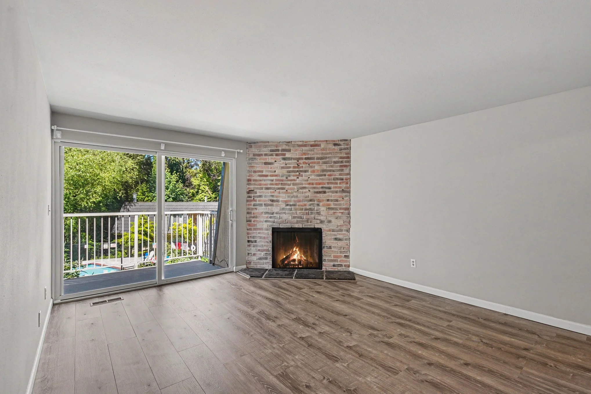 Living room with slider to back balcony