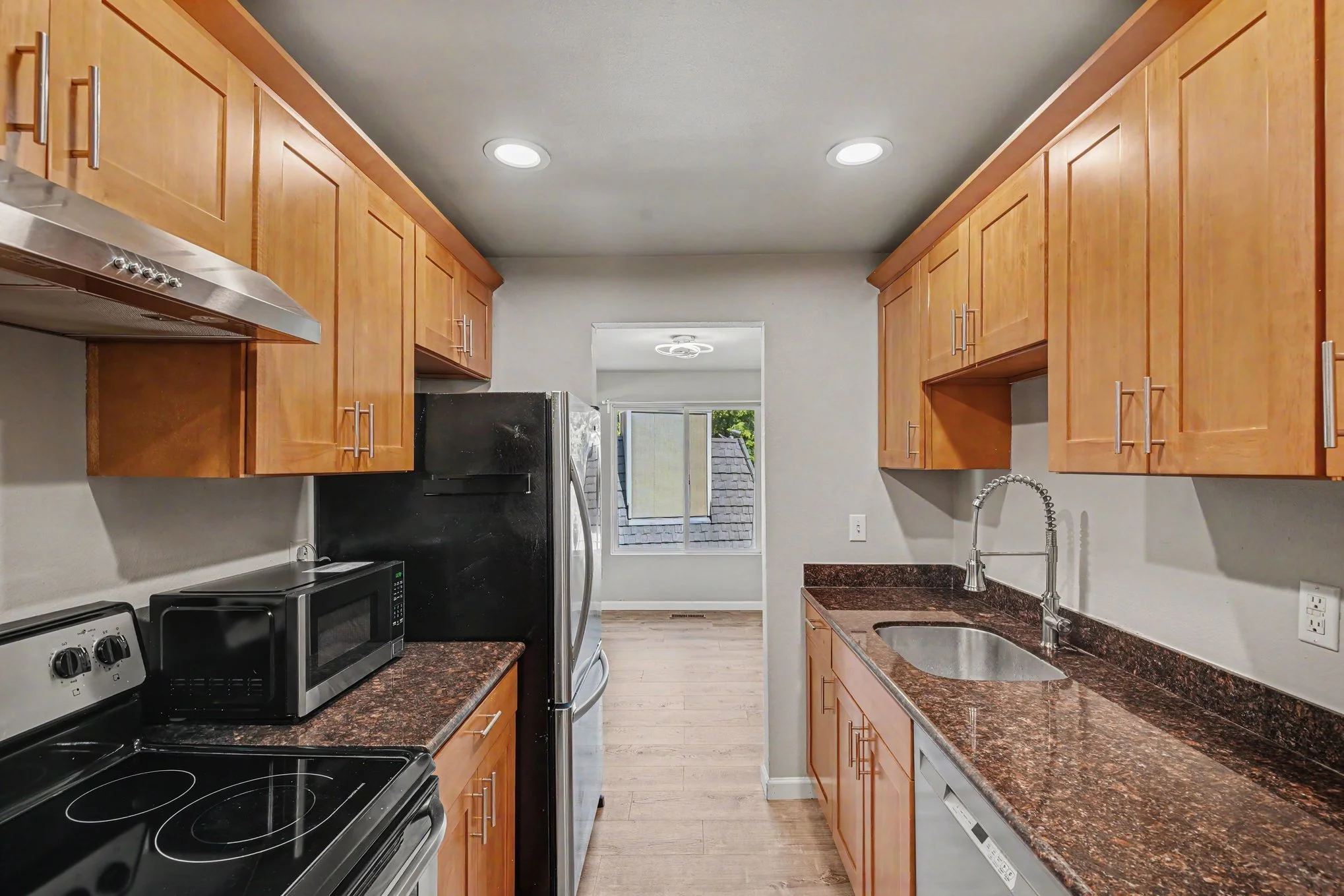 Beautiful kitchen with stainless steel appliances and sleek counters
