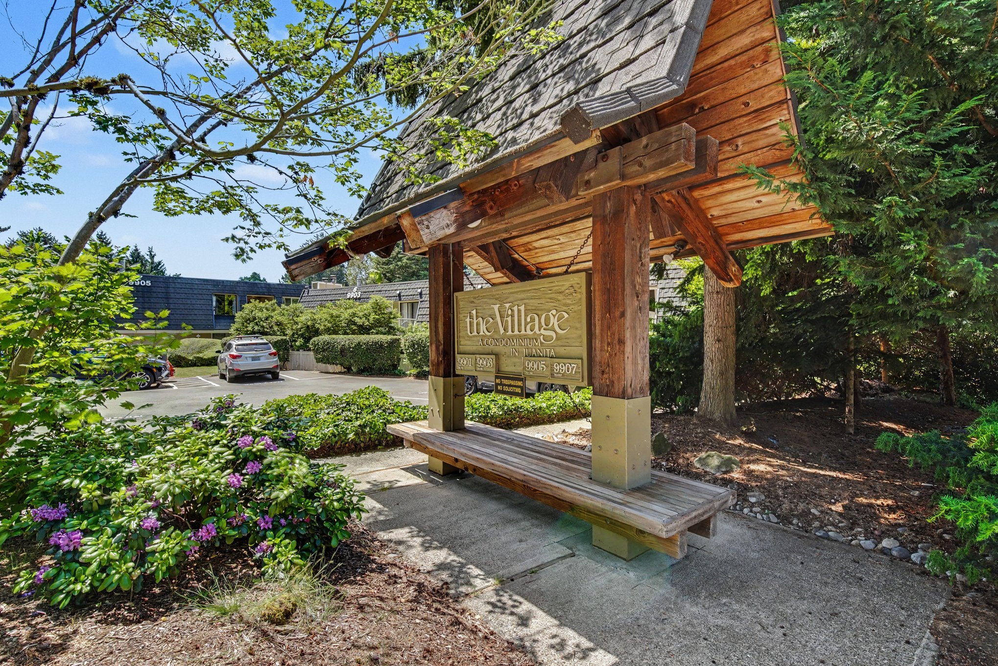 The Village Condominiums covered sign