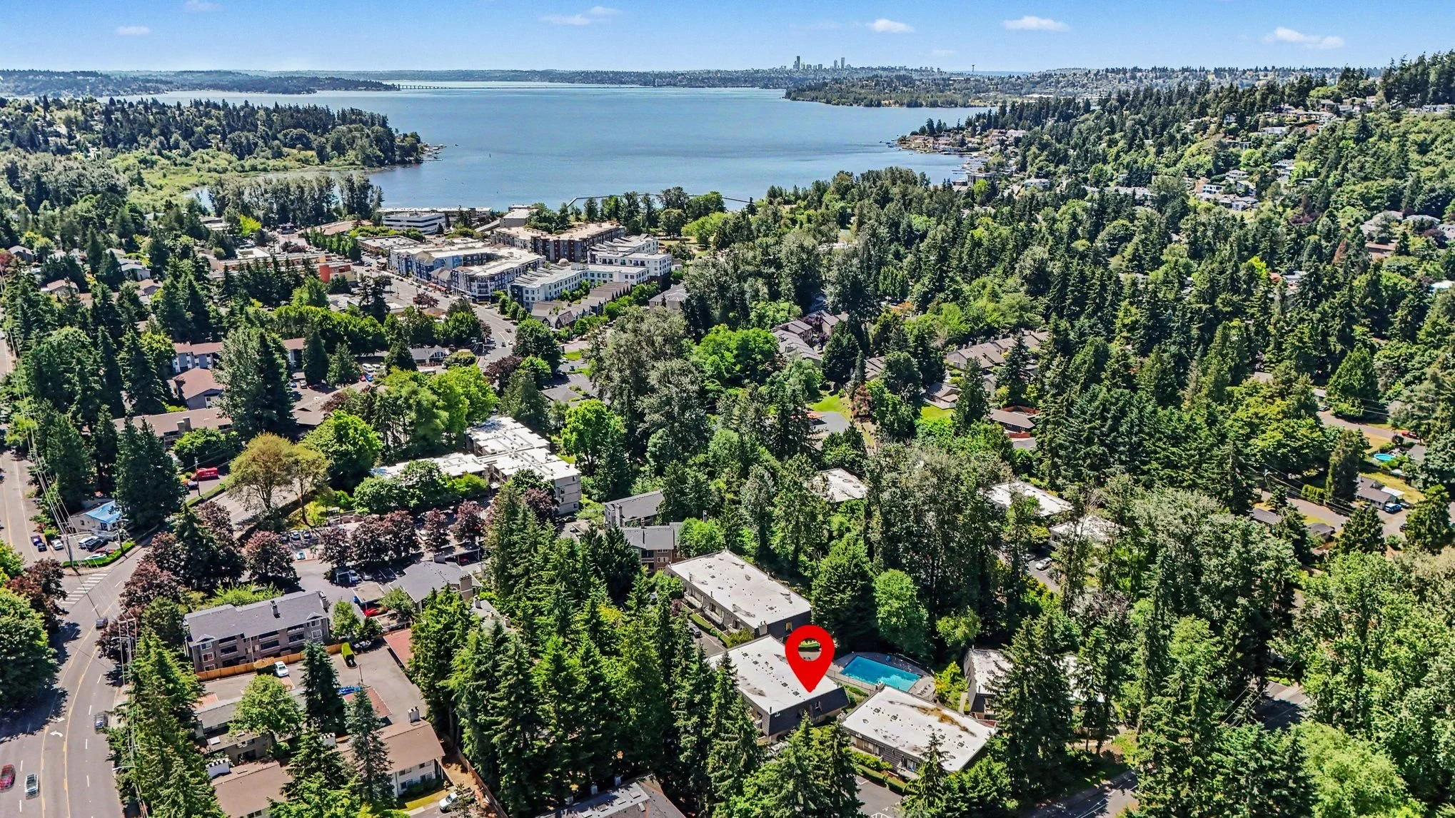 Aerial view of Juanita Neighborhood with Lake Washington in background and the city of Seattle in the far back right
