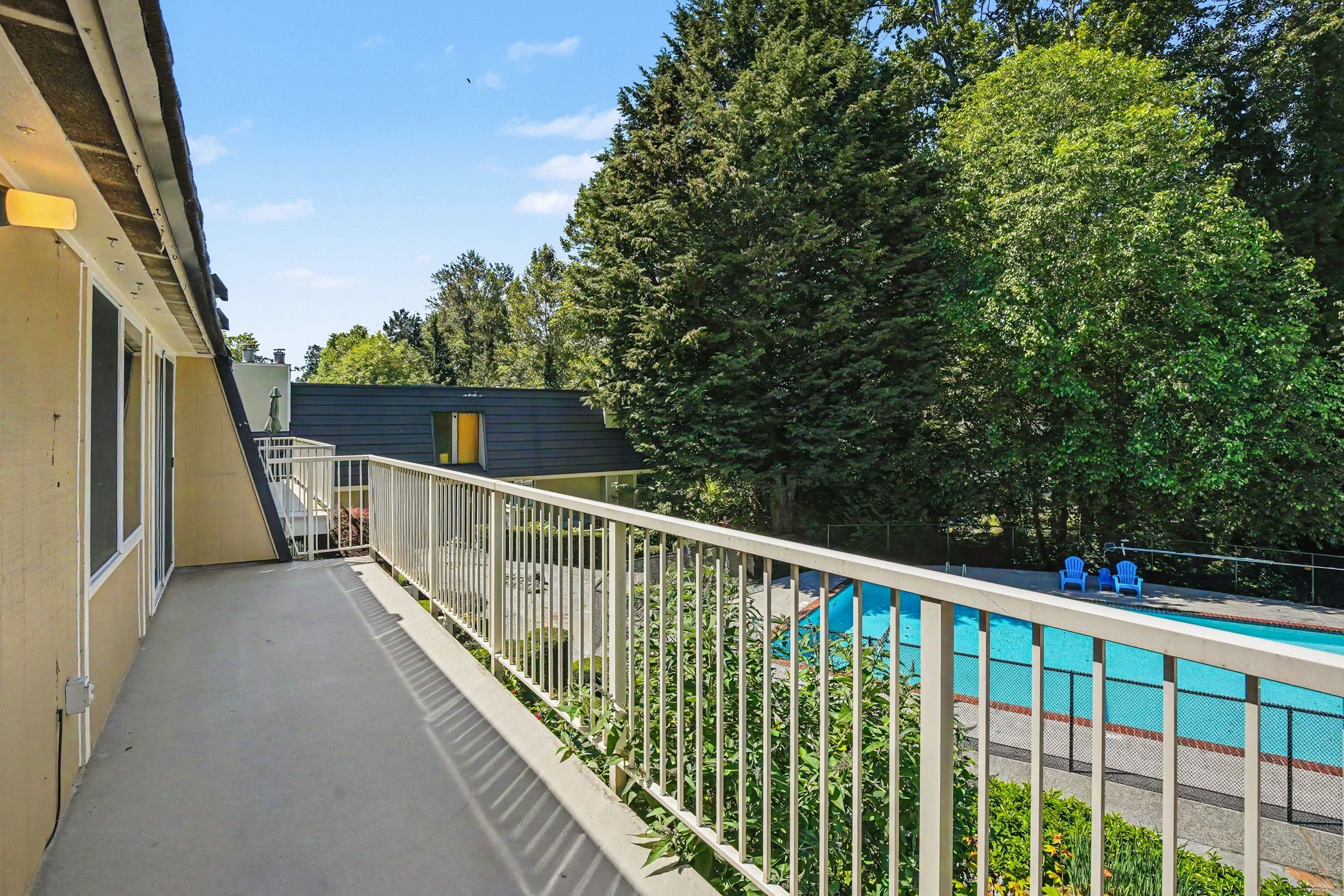 Private Balcony with view of pool and greenbelt
