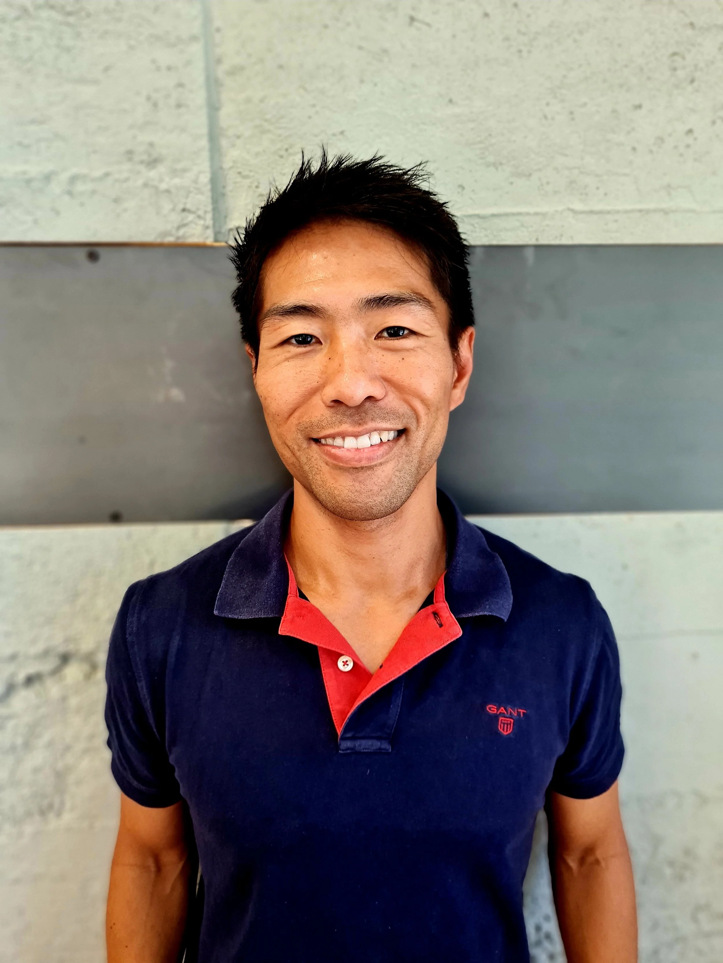 Tomu Hiratsuka, physiotherapist at Urban Athlete Auckland specialising in sports injury rehabilitation with a focus on tendons, lower limb and shoulder conditions