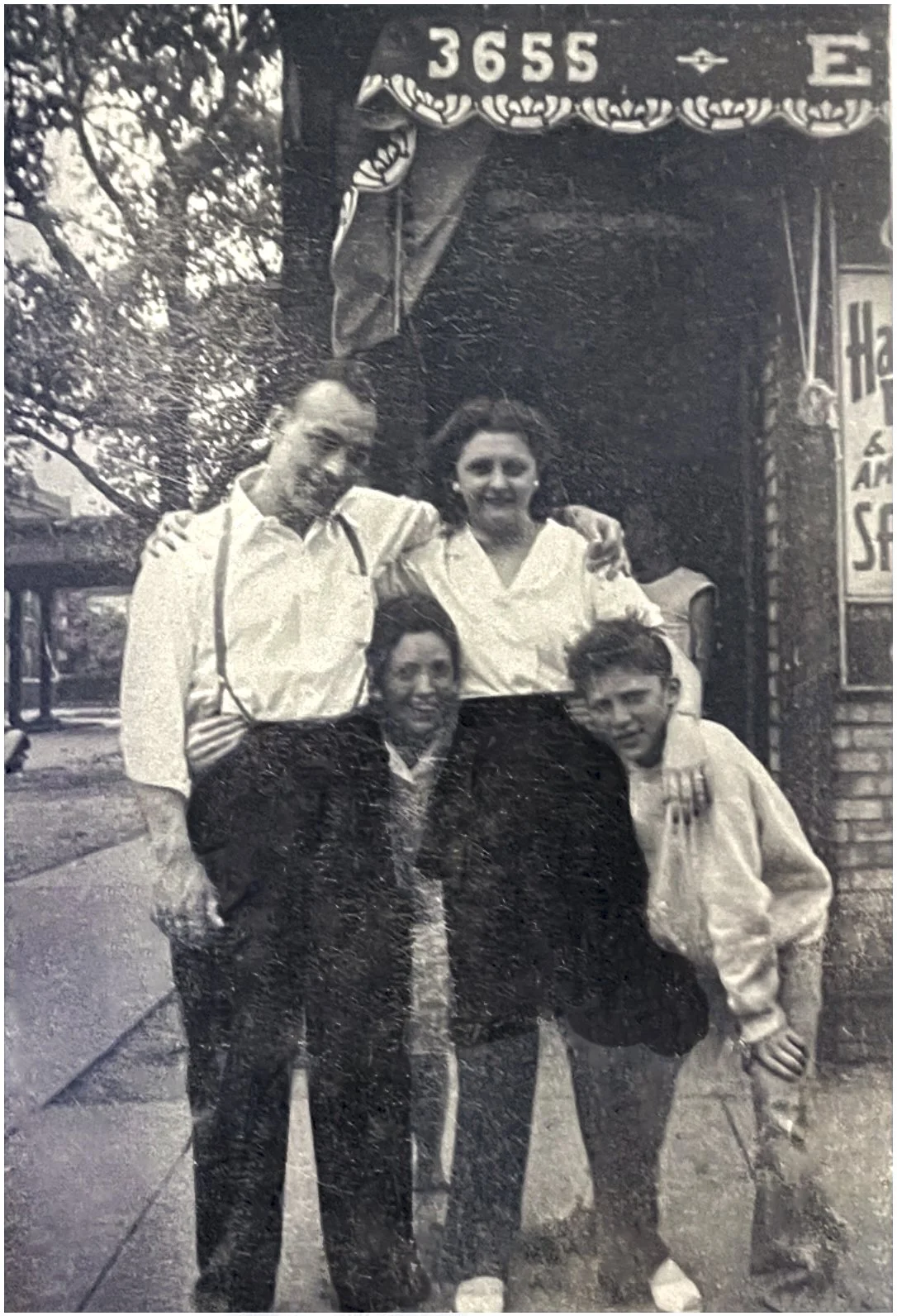 Margaret and Eddy Pareti bent over. 1945
