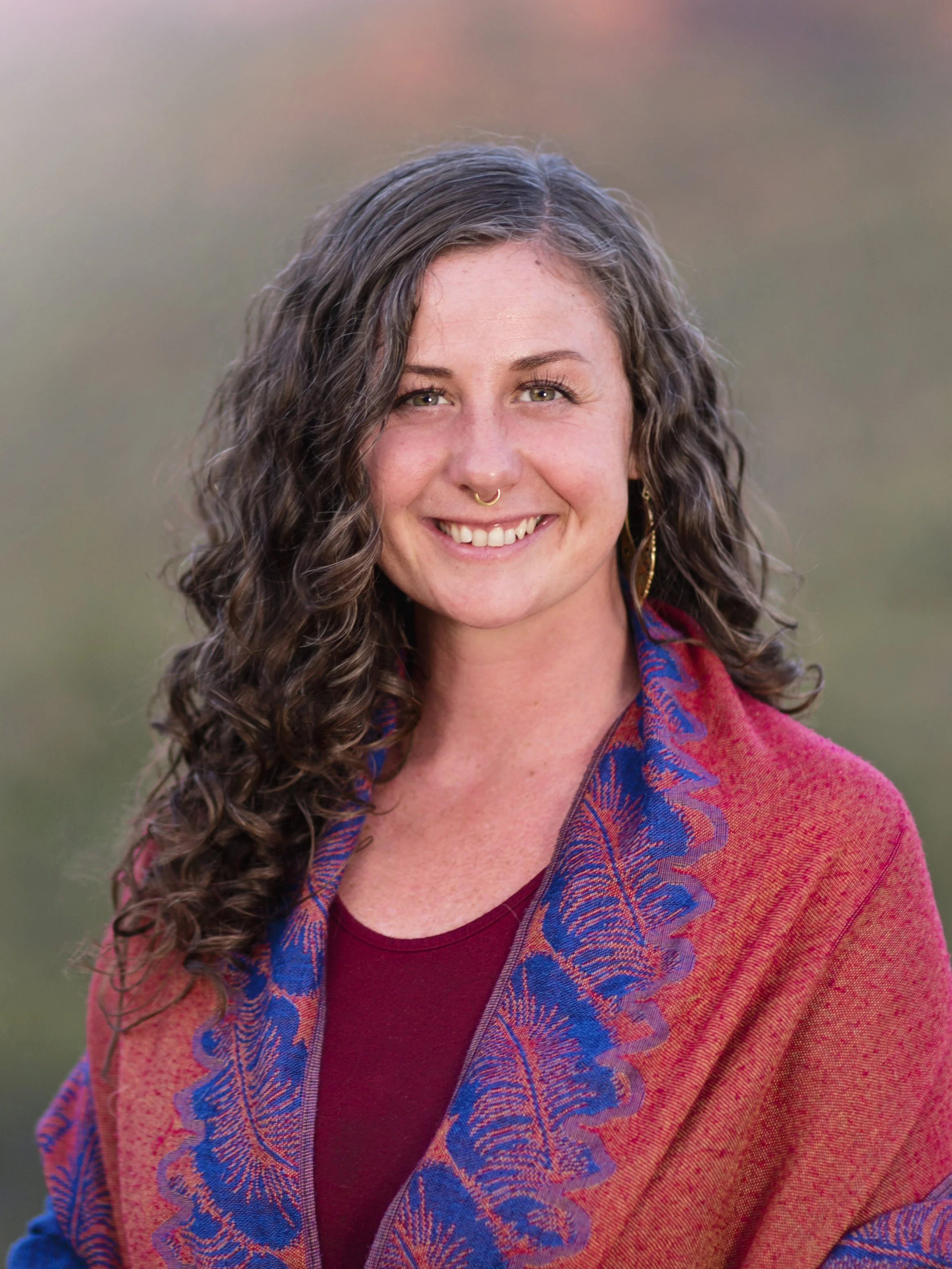 Ashé, massage therapist at Body Alchemy Sedona specializing in Therapeutic, Sound and Divine Embodiment Massage