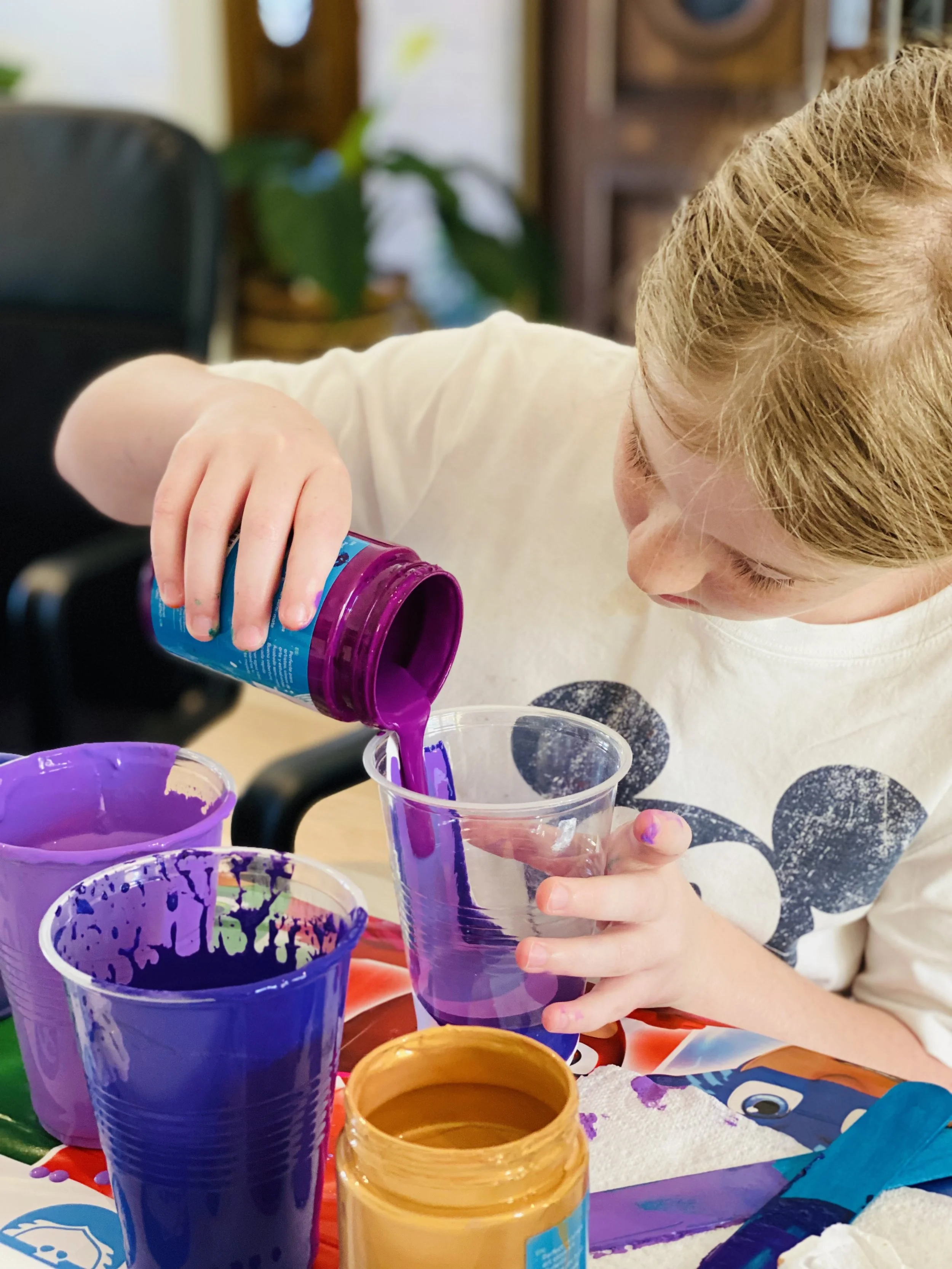 Ava pouring her cups | Paint, Play & Pour Workshop