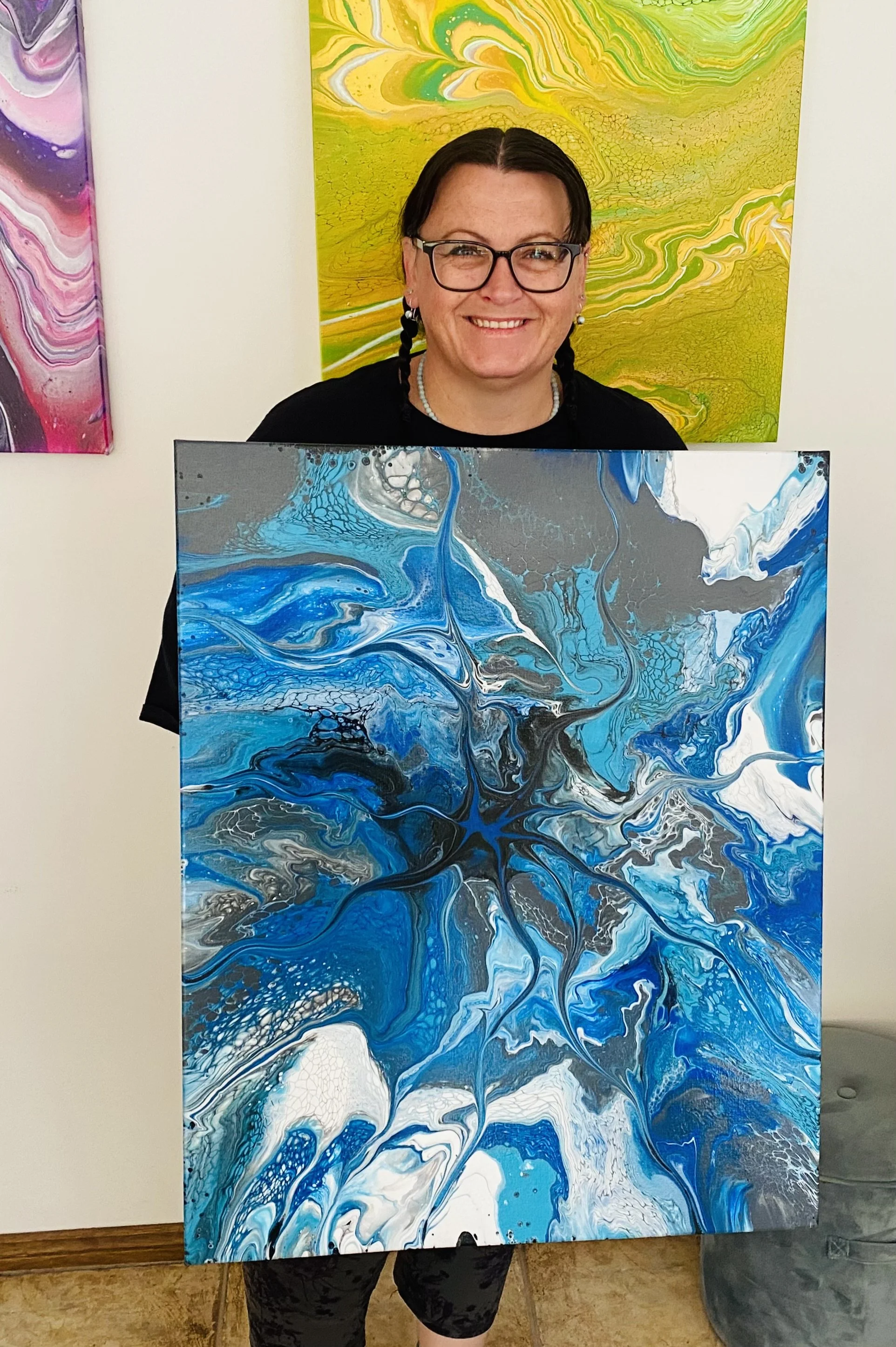Romy and one of her many Artworks | Paint, Play & Pour Workshop